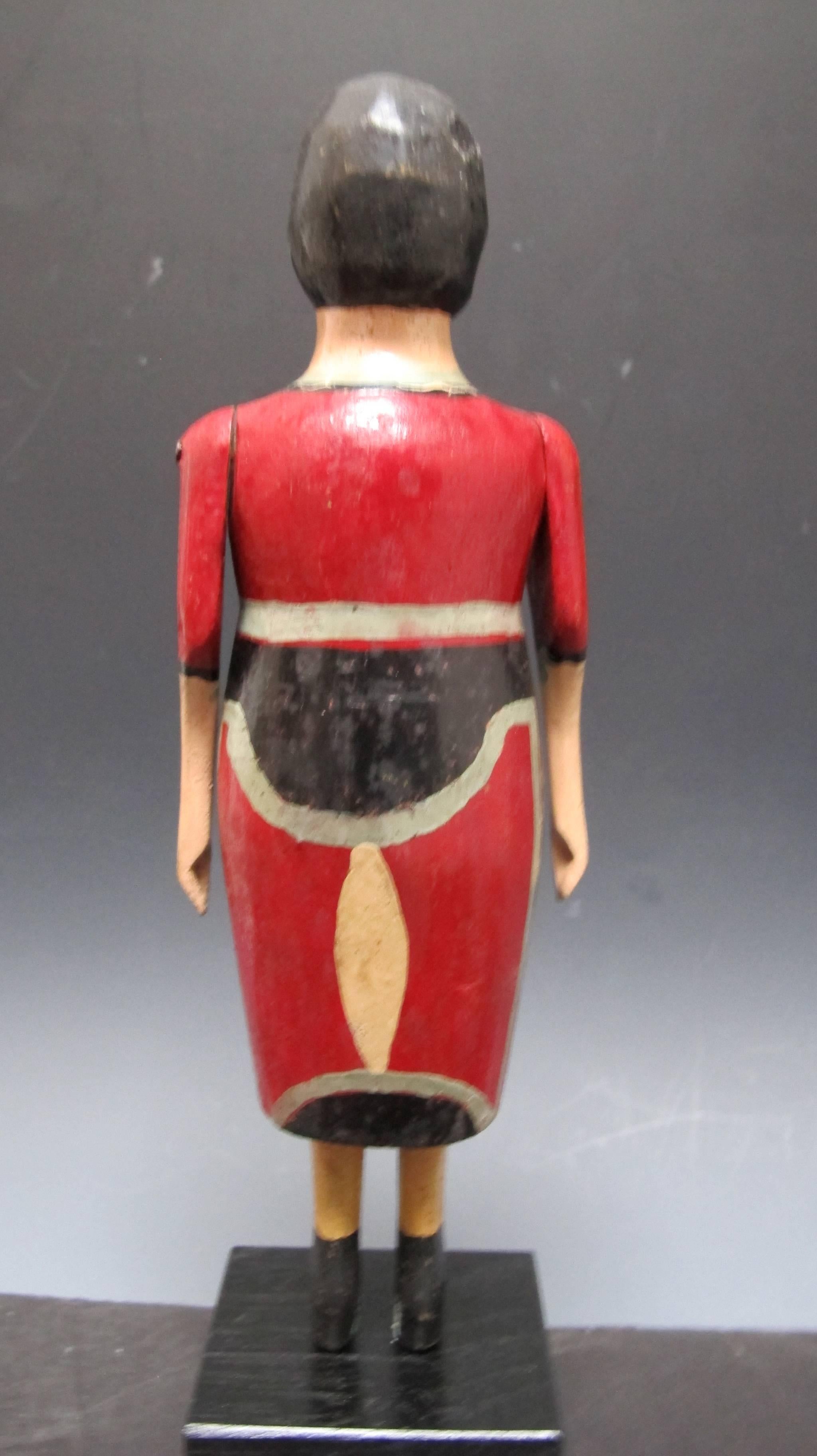 American Carved Wood Folk Sculpture of Woman in Red