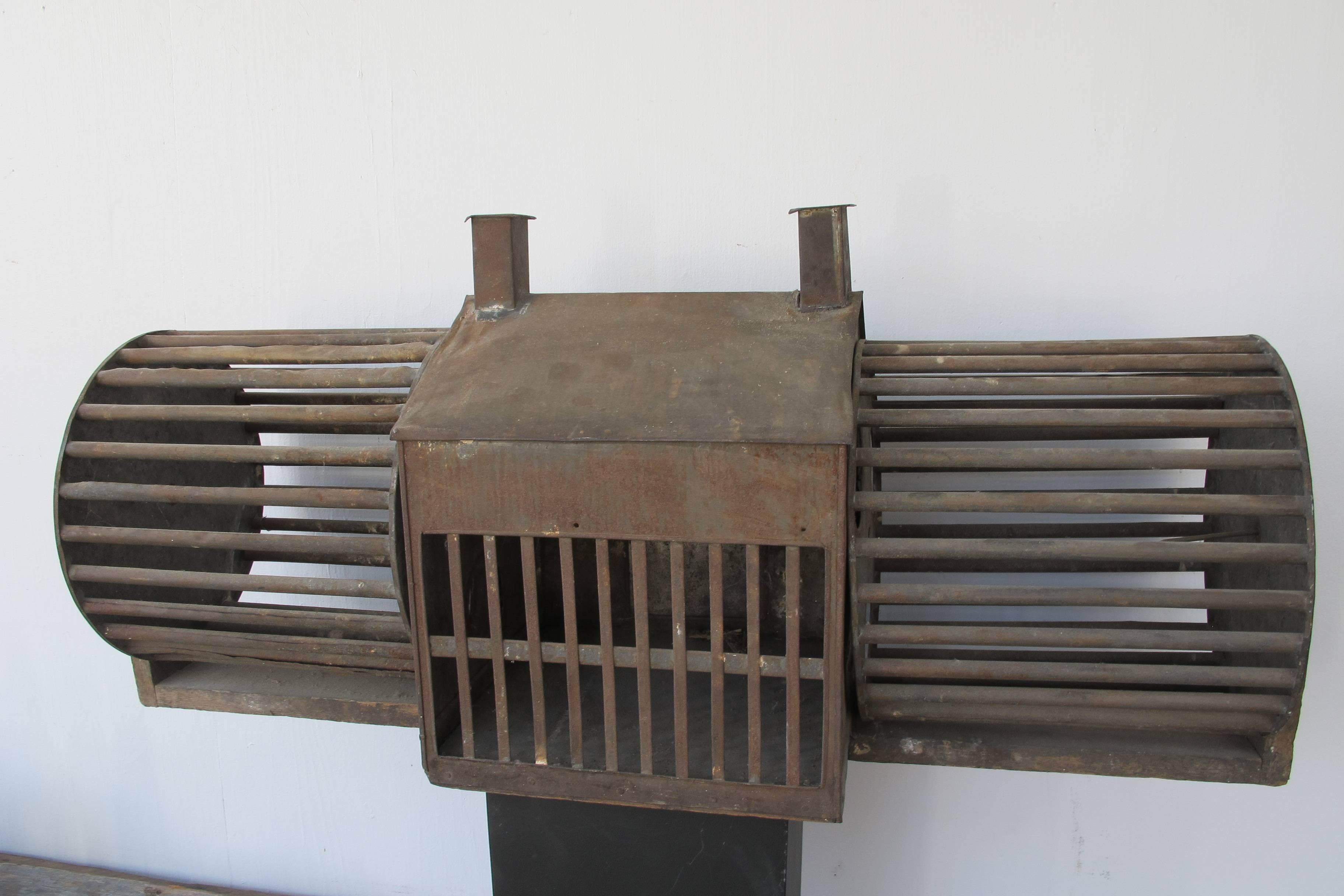 Sculptural Tin Squirrel House with Double Wheels In Good Condition For Sale In New York, NY