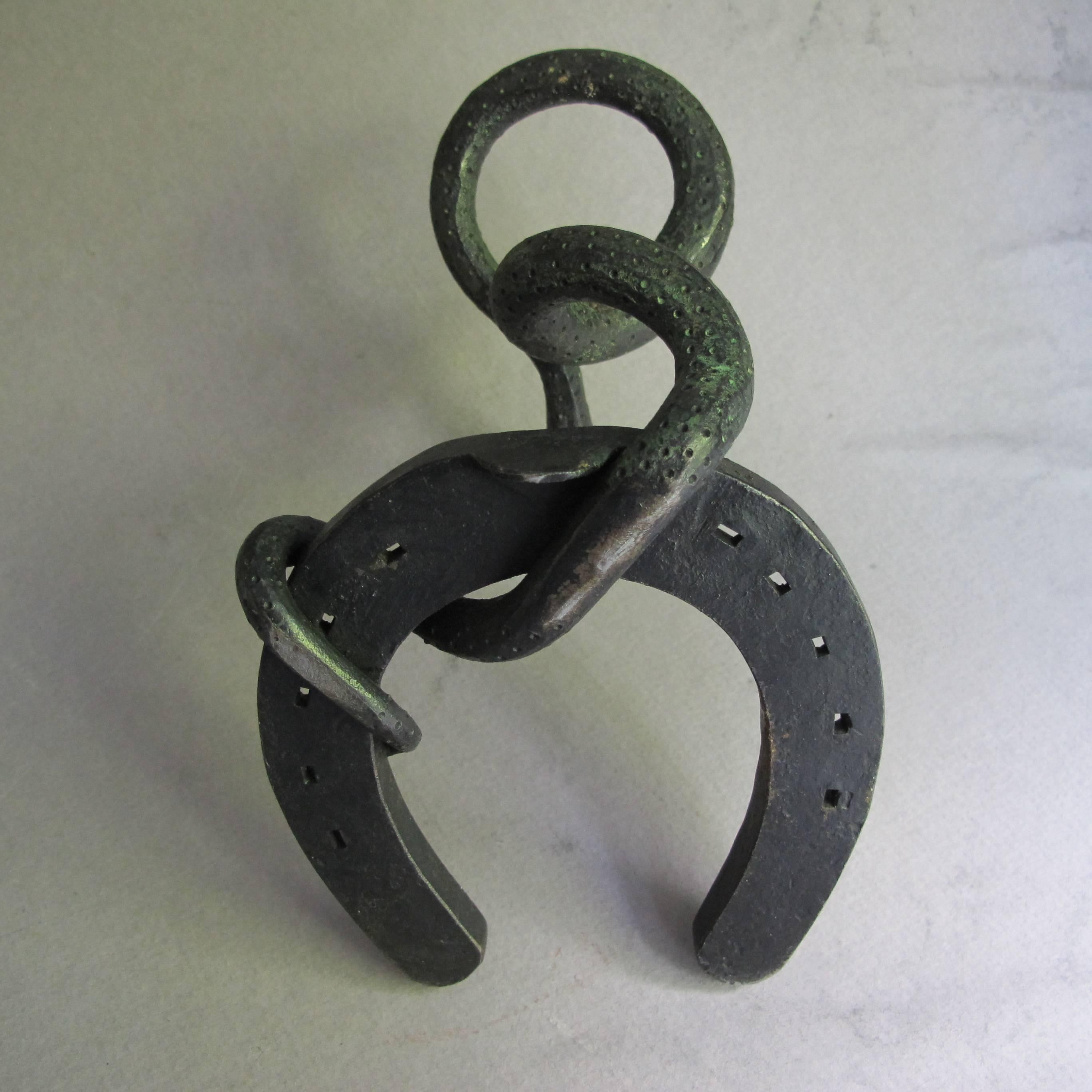 Folk Art Forged Iron Snake and Horseshoe Intertwined For Sale