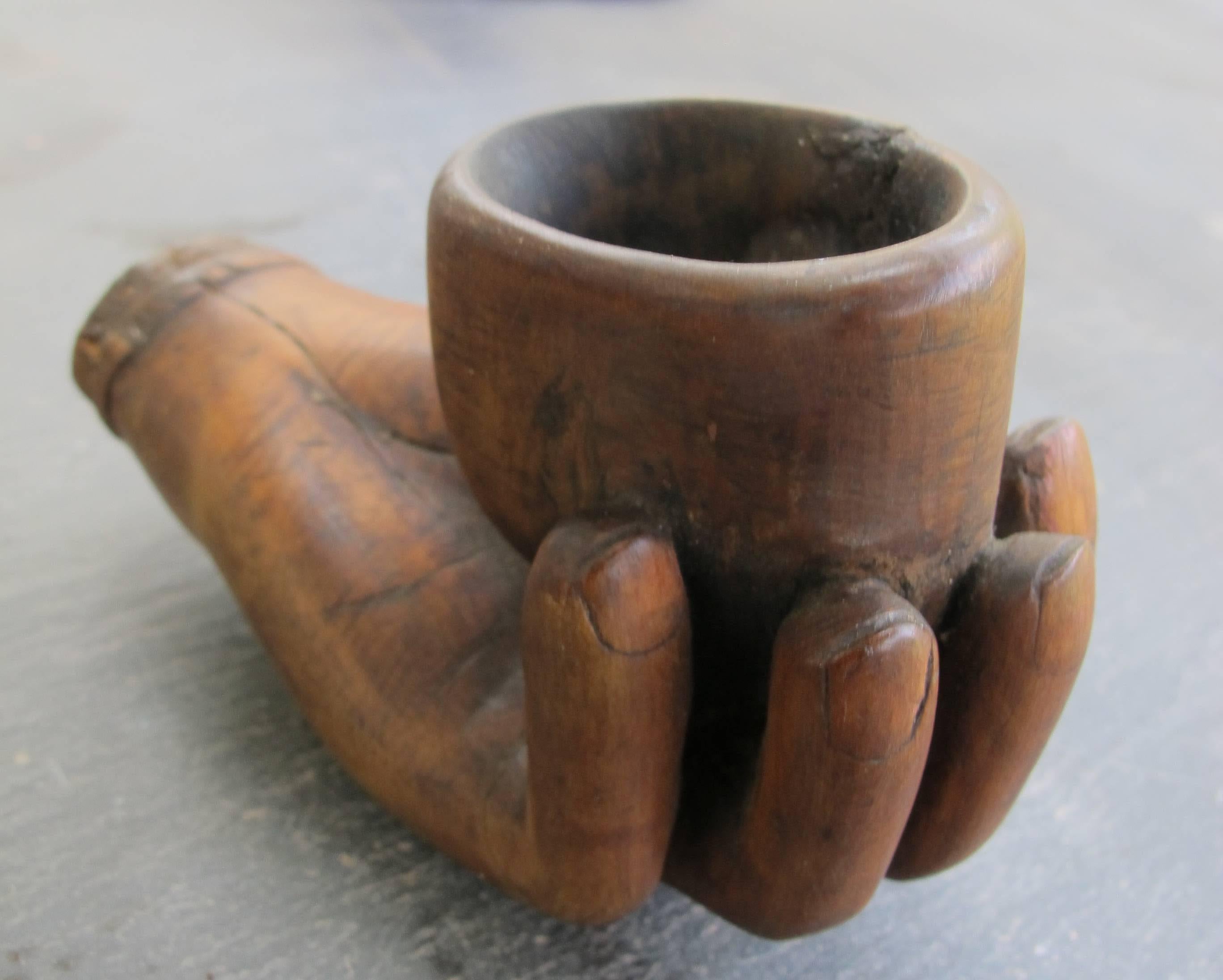 hand holding pipe