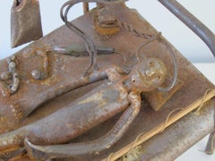 Iron Fisherman in Bed Folk Sculpture