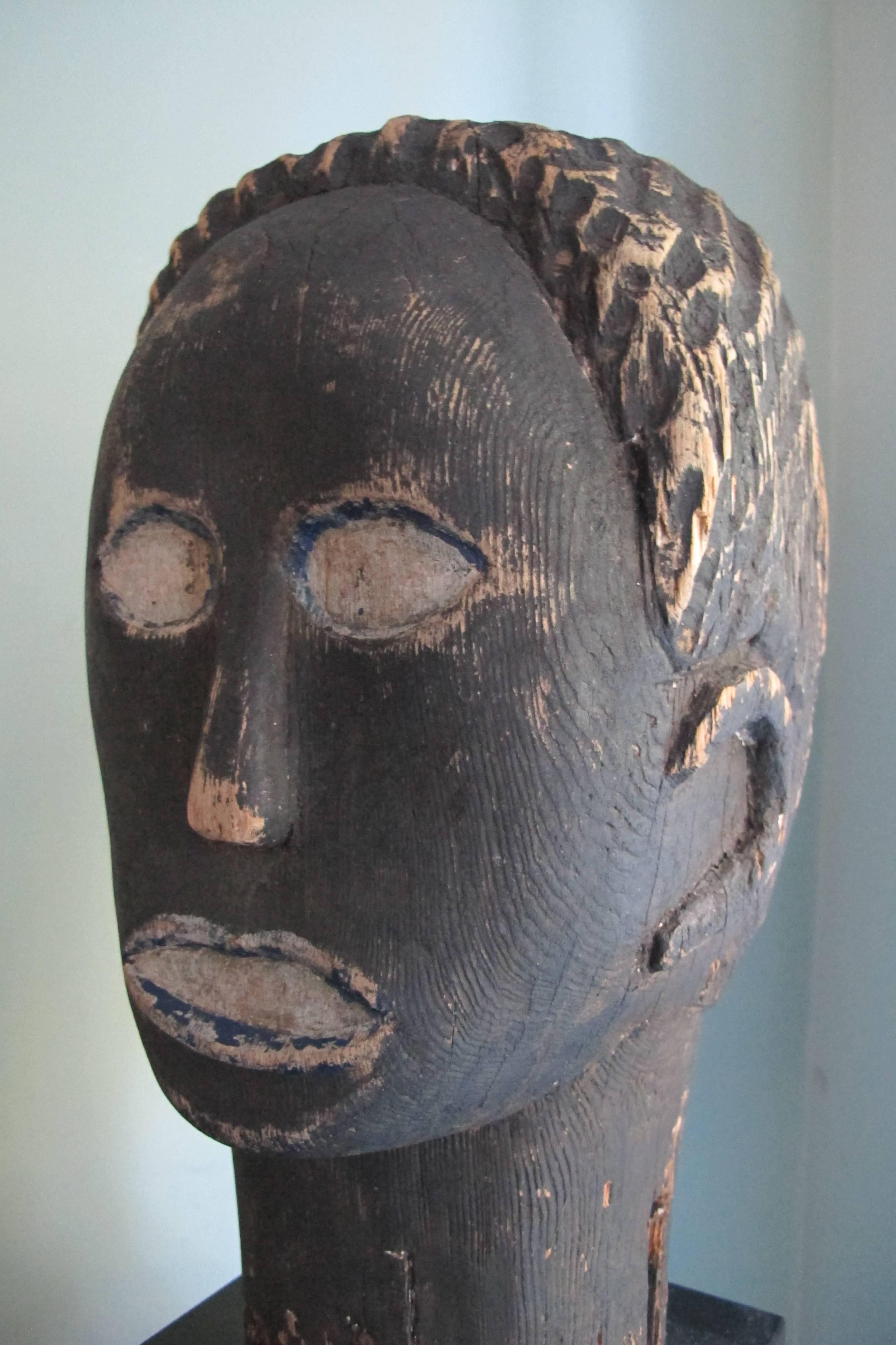 Carved Black Wood Head Folk Art Sculpture For Sale