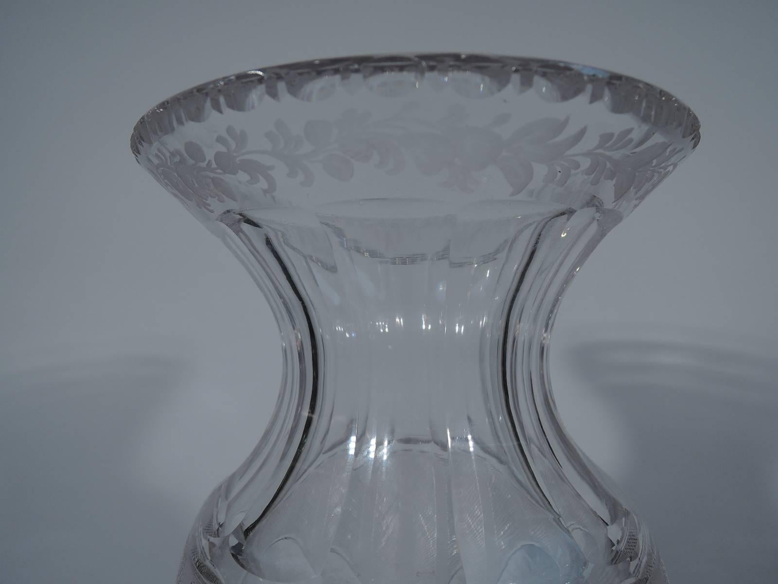 Cut-glass and sterling silver vase. Made by Hawkes in New York, circa 1910. Baluster body with base knop and concave neck. Alternating stripes and lattice and oval frames acid-etched with flower baskets. Fish scale bottom, faceted knop and lobed