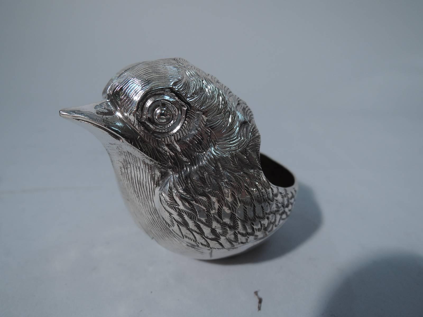 Pair of antique sterling silver open salts in form of baby chicks. Each: round body with downy feathers and small upturned beak. Hollow with open back. Adorable. Indistinct hallmark.

Dimensions: H 2 3/4 x W 3 1/8 x D 2 in. Total weight: 3.1 troy