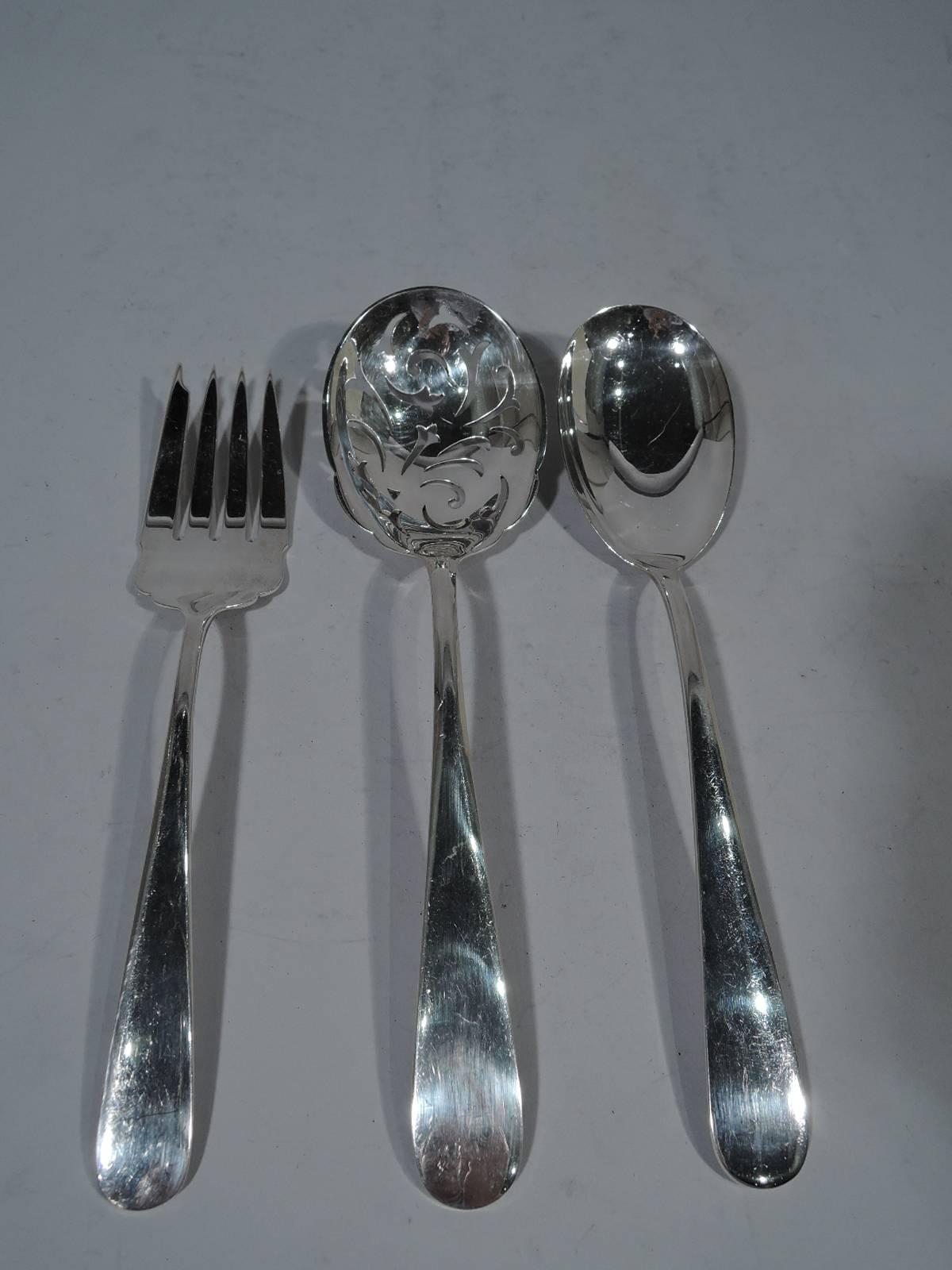 Sterling silver dinner service in Old Maryland Plain pattern. Made by S. Kirk & Son in Baltimore. This set comprises 72 pieces (all dimensions in inches): Knives: 11 dinner knives (9 5/8) and 10 butter spreaders (6 1/8); Forks: 12 dinner forks (7