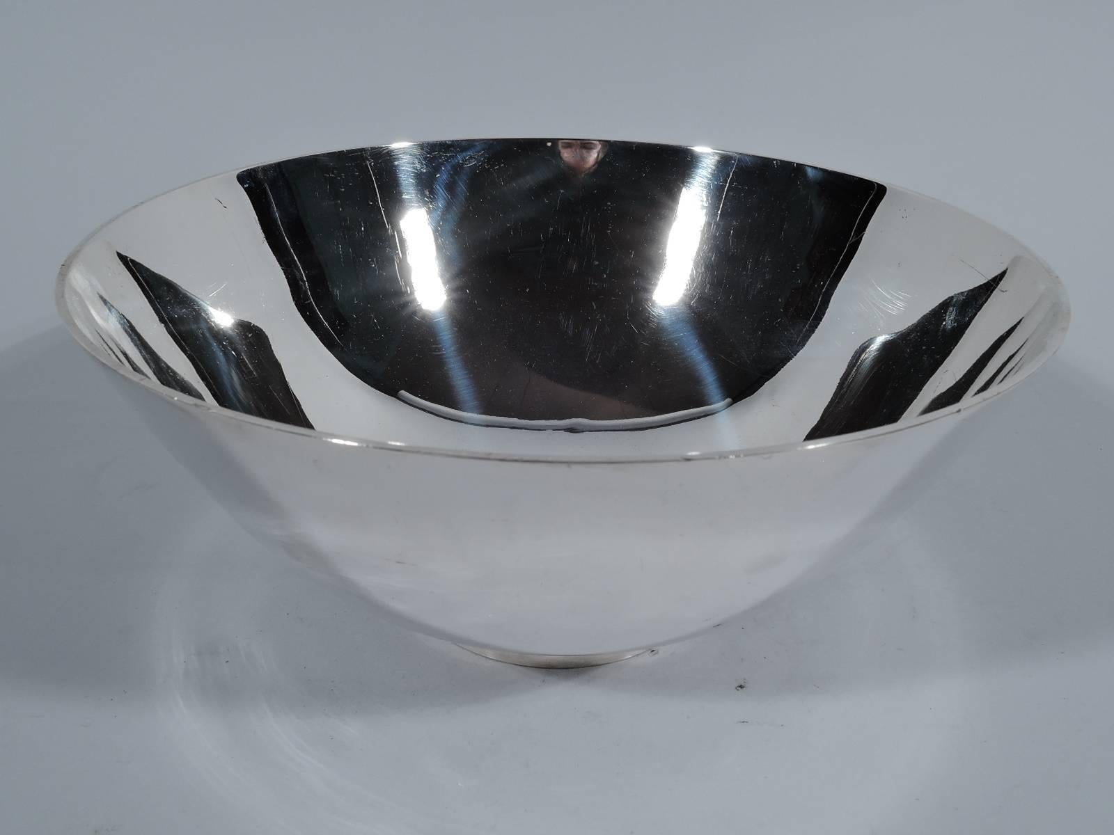 American Colonial sterling silver bowl. Made by Tiffany in New York. Bowl has curved sides and straight circular foot. Spare historic design that works equally well in Modern interiors. Hallmark includes pattern no. 19750, director’s letter M