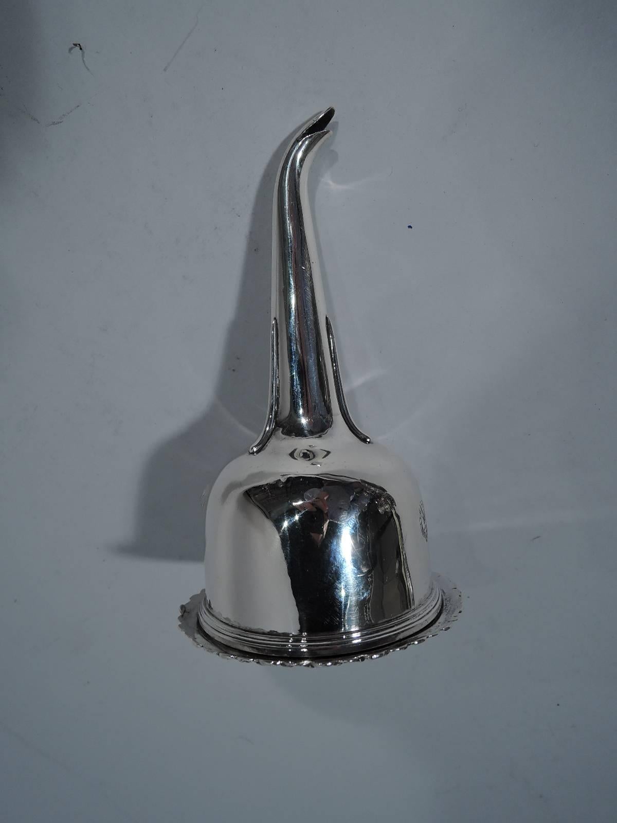 William IV silver wine funnel. Made John McKay in Edinburgh in 1835. Strainer has turned-down rim with worked leaf-and-dart border and pendant scallop shell, and is set in bowl with moulded rim and engraved armorial. Late Georgian design with
