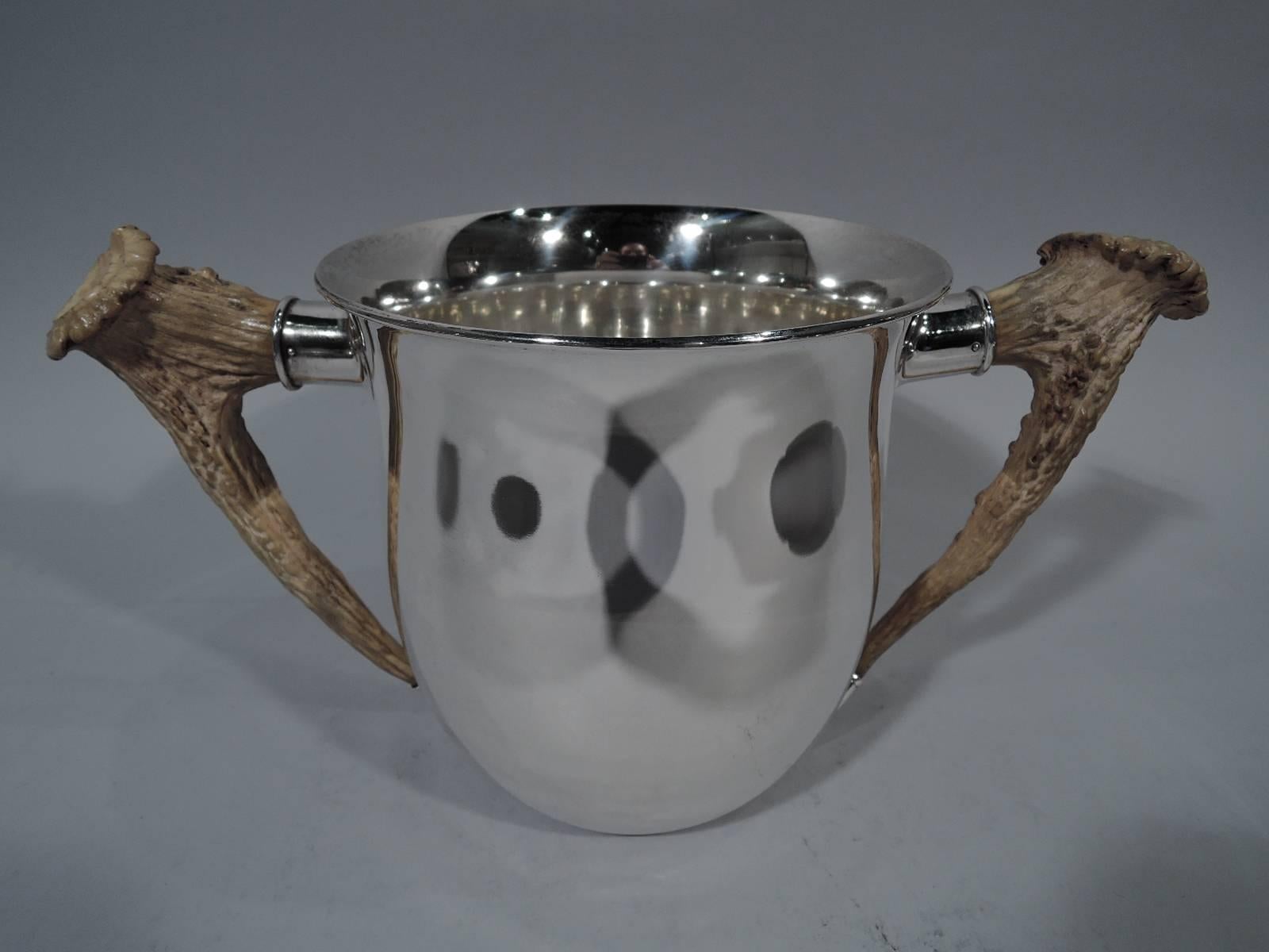 Sterling silver trophy cup with horn handles. Made by Gorham in Providence, ca 1890. Urn with flared rim. Horn side handles set in silver mounts. Holds 4 3/4 pints of bubbly. Very alpha – very much a first prize. Late 19th century hallmark includes