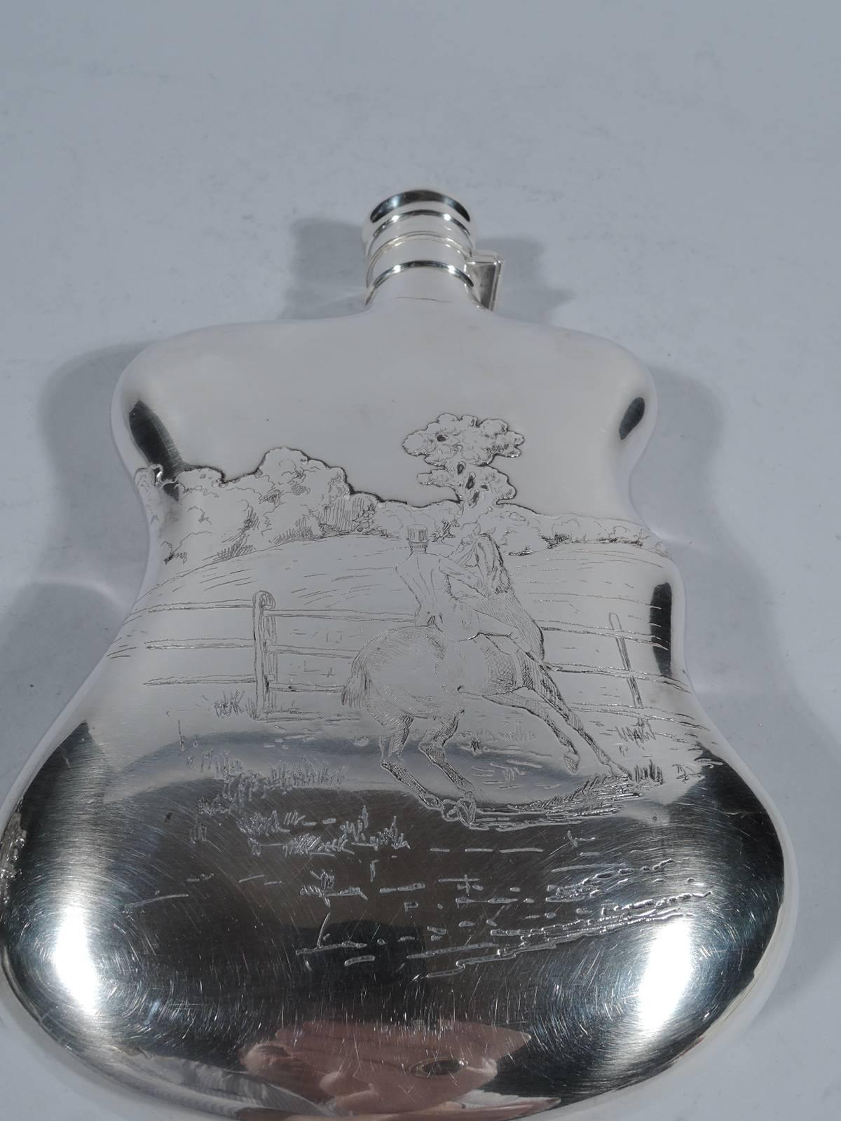 Sterling silver flask with fox hunt motif. Made by Gorham in Providence in 1885. Easy-grip shape with hinged and cork-lined cover. Engraved and acid-etched scenes. On the front, hunters ride through the countryside. On the back, a top-hatted rider