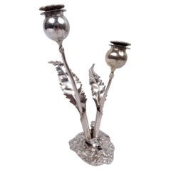 Eleganti Shakers per sale e pepe a forma di fiore di stelo in argento di Buccellati