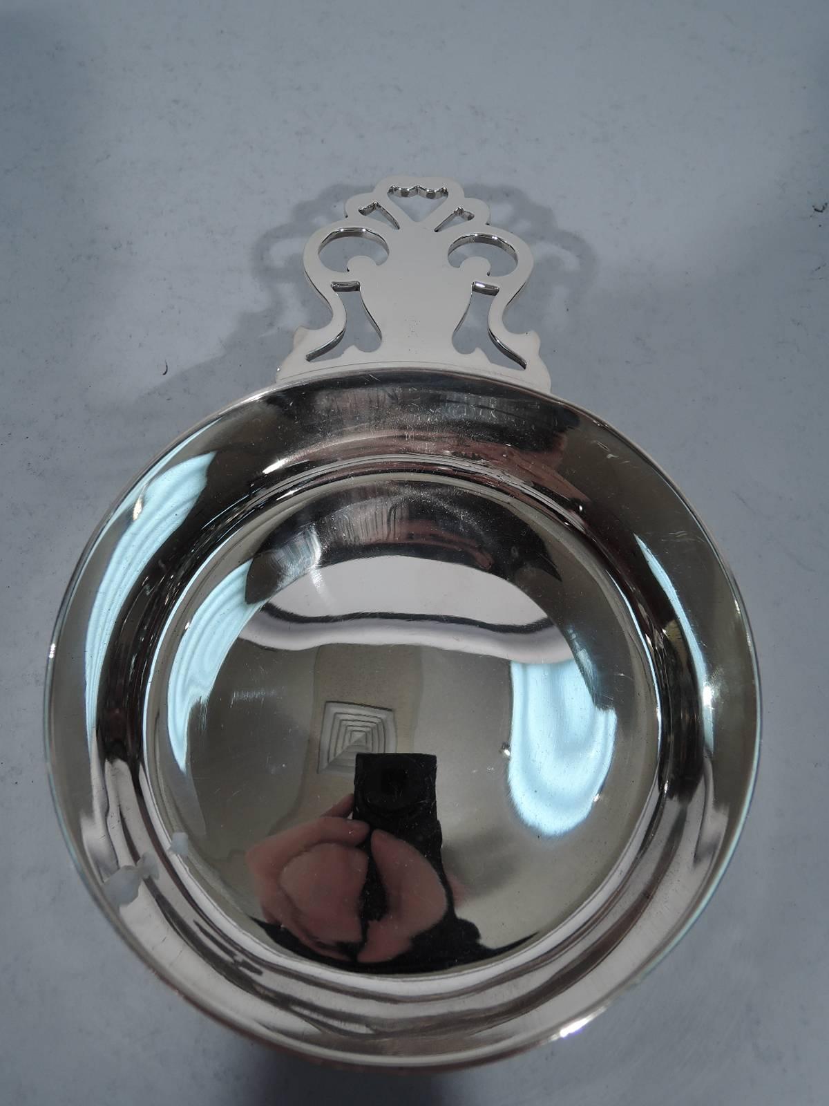 Sterling silver porringer. Made by Tiffany & Co. in New York. Straight sides and open vase handle. The Classic design with lots of room for engraving. Hallmark includes pattern no. 5796D, director’s letter m (1907-1947), and wartime star