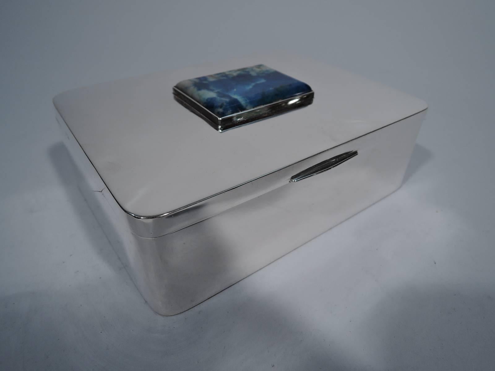 Chic Portuguese 916 silver box. Rectangular with curved covers. Cover hinged and inset with rectangular lapis lazuli plaque. Box interior cedar lined. Fine form and craftsmanship. Hallmark includes Lisbon retailer's name W. A. Sarmento. Very good