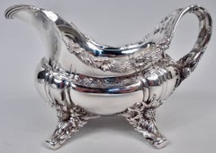 Pair of Early Tiffany Chrysanthemum Sterling Silver Gravy Boats