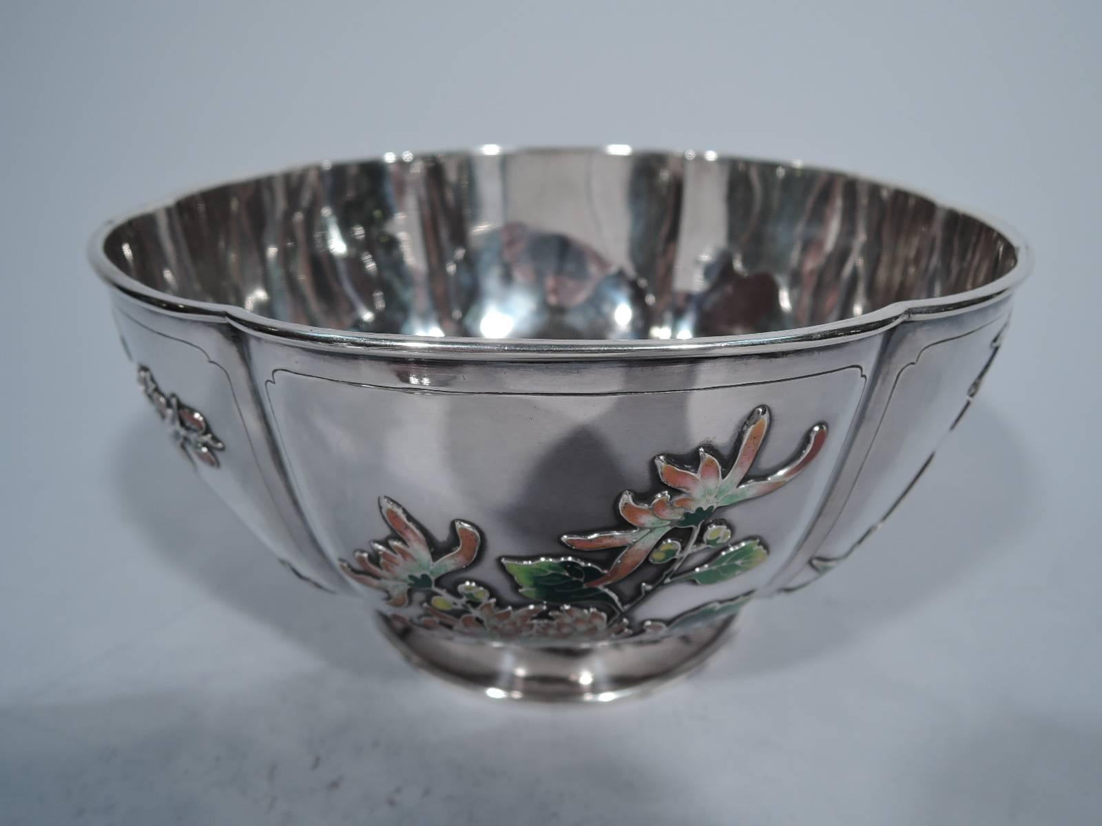 Rare Chinese silver and enamel bowl, circa 1900. Curved and lobed sides. Raised foot. Incised frames with enameled bamboo, chrysanthemum and birds perched on blossoming branches. Wonderful period motifs finely depicted. Hallmark includes Chinese