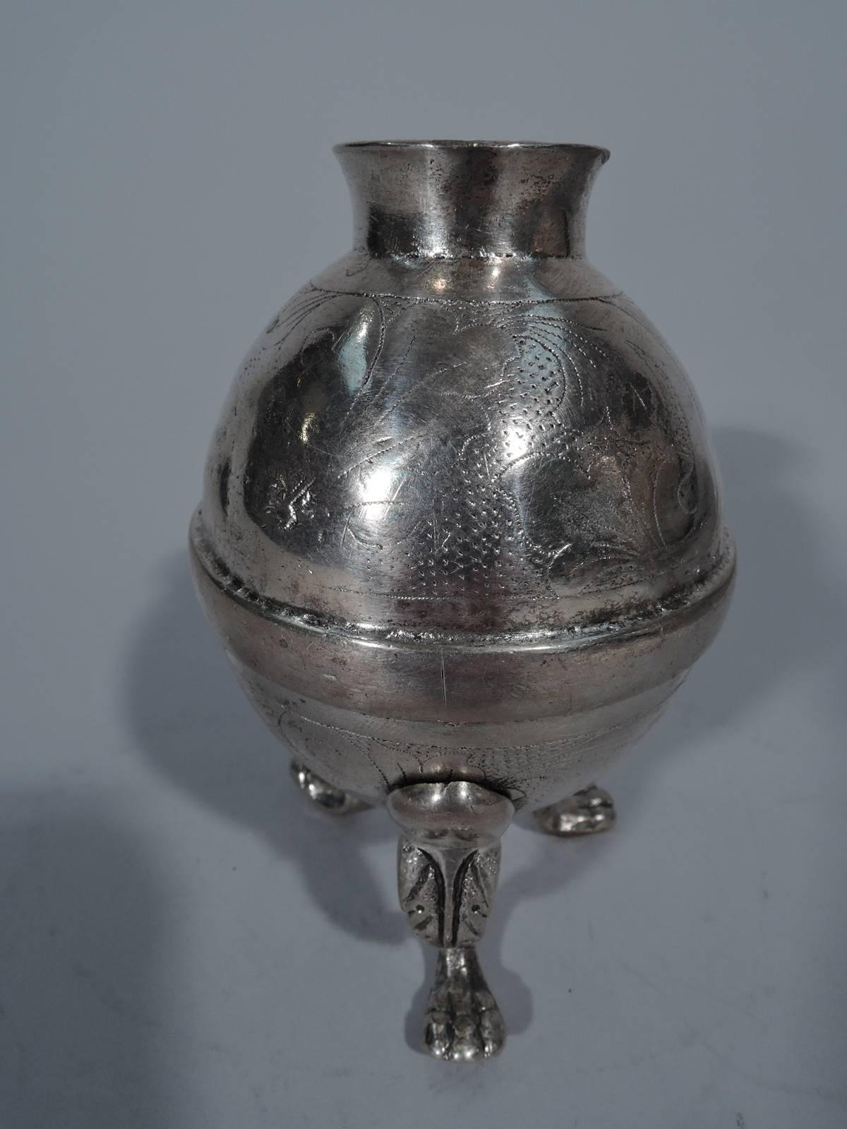 A very nice silver mate cup. Handmade in South America, circa 1850. Globular body with three scrolled supports terminating in paws. Fine quality engraved scrolls and leaves on body and supports. Thick silver gauge. Condition: Original patina with