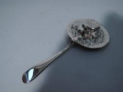 Antique Repousse Sterling Silver Tea Strainer by Stieff of Baltimore