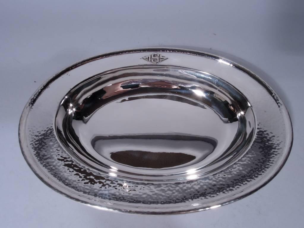 Sterling silver bread tray. Made by Durgin in Concord, New Hampshire, circa 1915. Plain oval well and hand-hammered rim with applied block monogram that is nicely integrated into the design. A fine example of the craftsman influence on a major