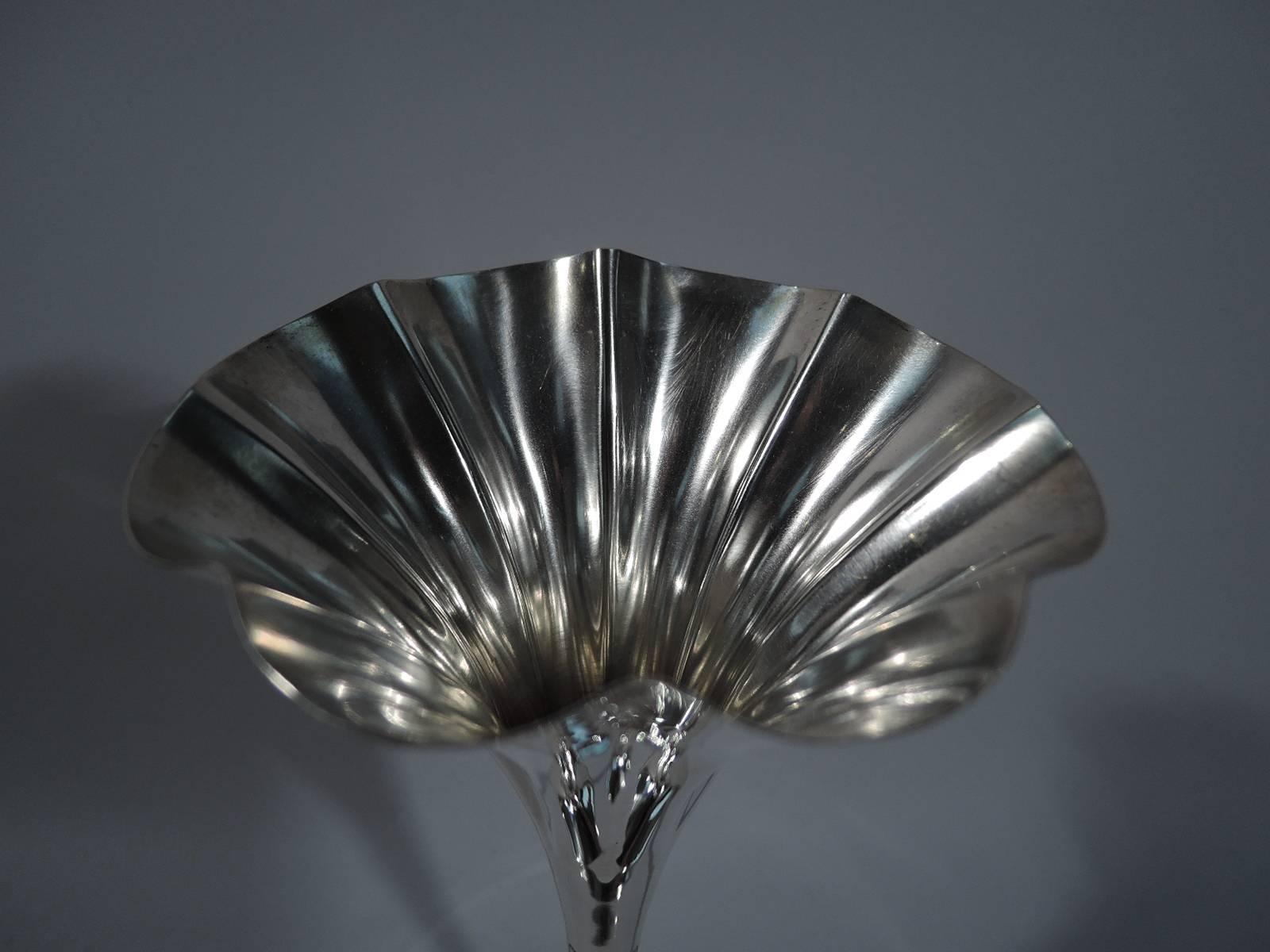 Sterling silver vase. Made by Tiffany in New York, circa 1893. Elongated fluted cone on small dome set in flat circular foot. Engraved gadroons and applied beads at base. Festive. Hallmark includes pattern no. 11908 (first produced in 1893) and