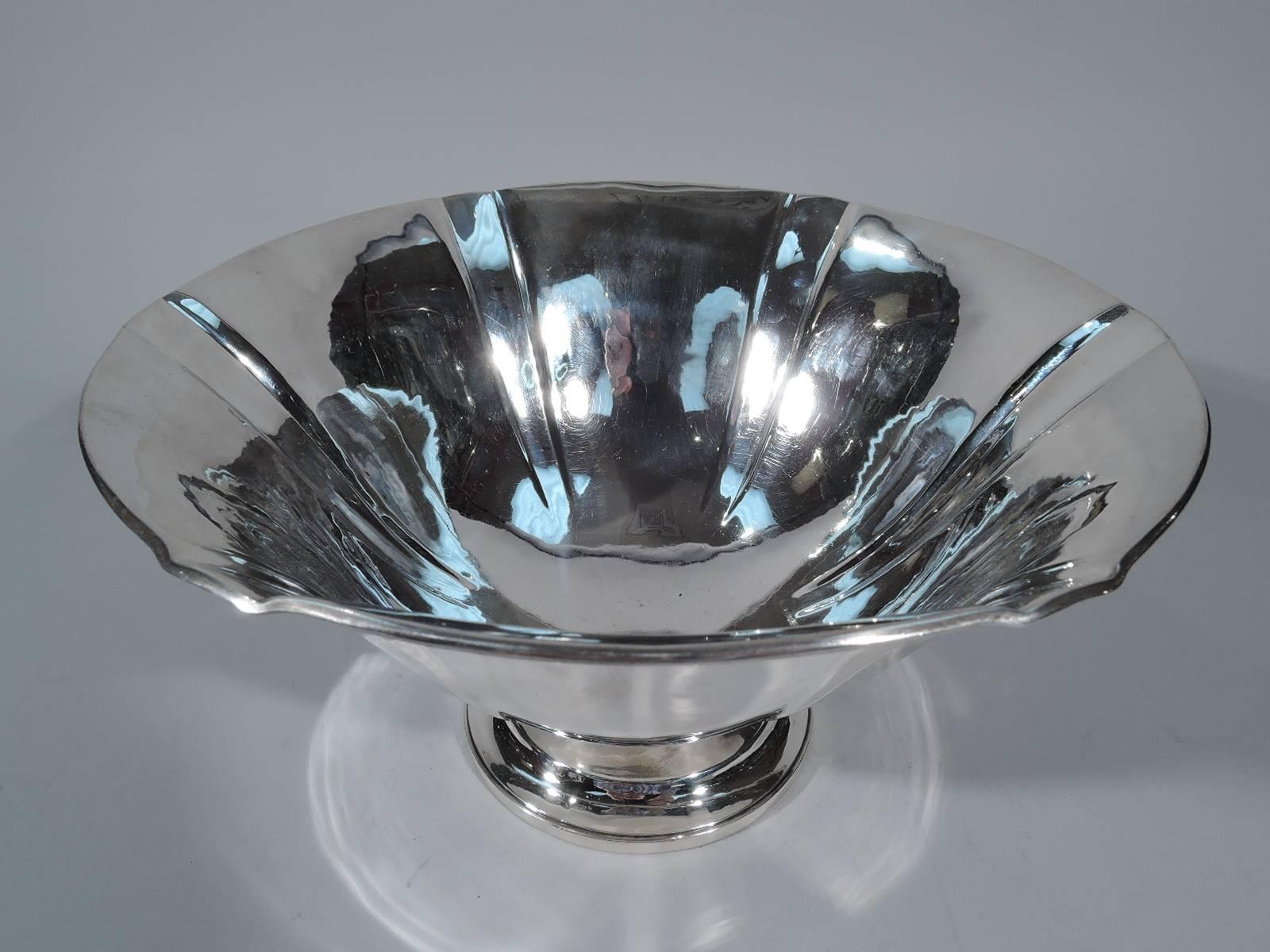 Sterling silver bowl. Made by Arthur Stone in Gardner, Mass., circa 1920. Tapering sides with six pilasters. Stepped circular foot. A fine piece by the historic Craftsman maker. Hallmark includes craftsman’s initial T for Herbert A. Taylor
