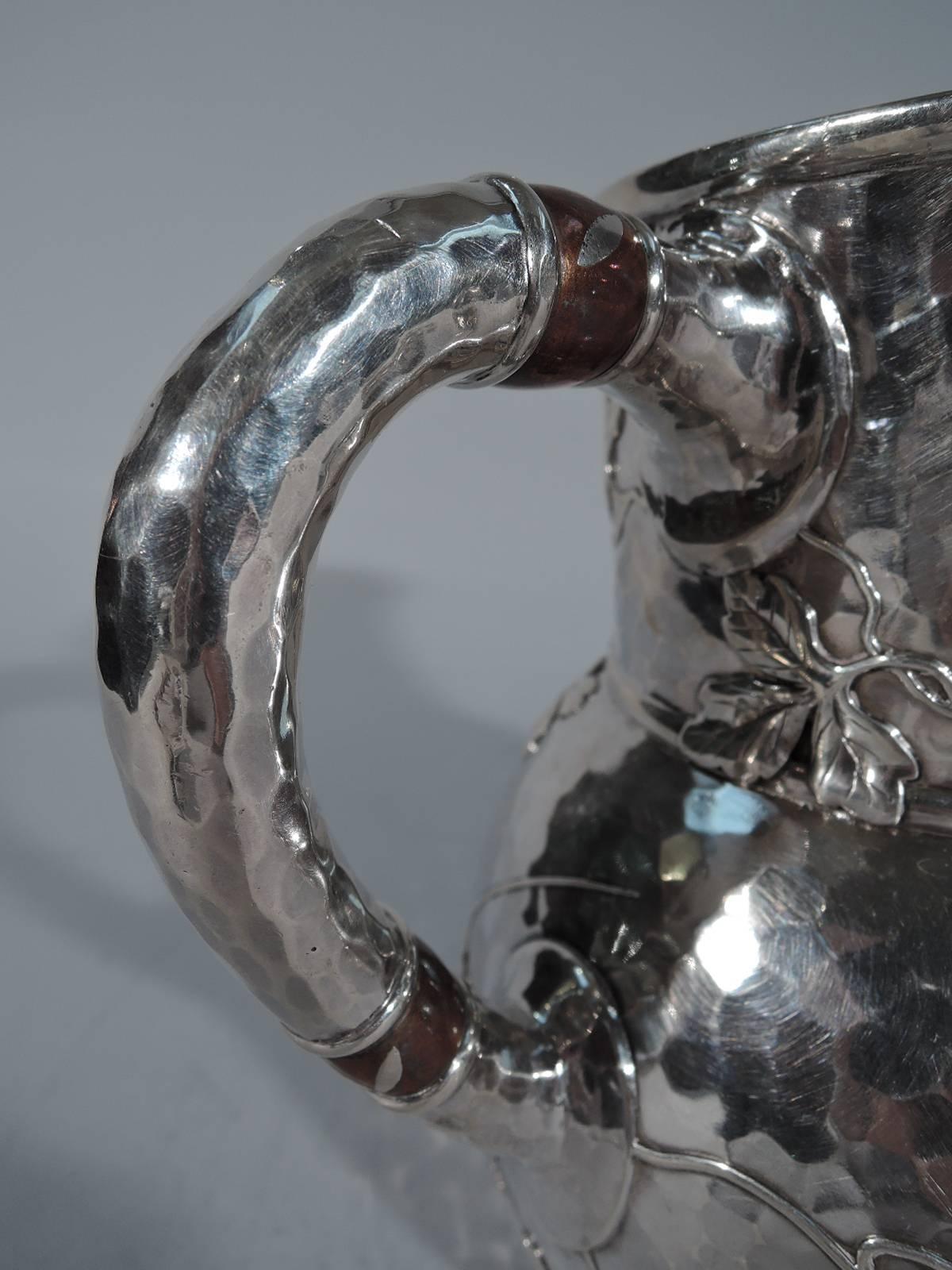 antique silver water pitcher