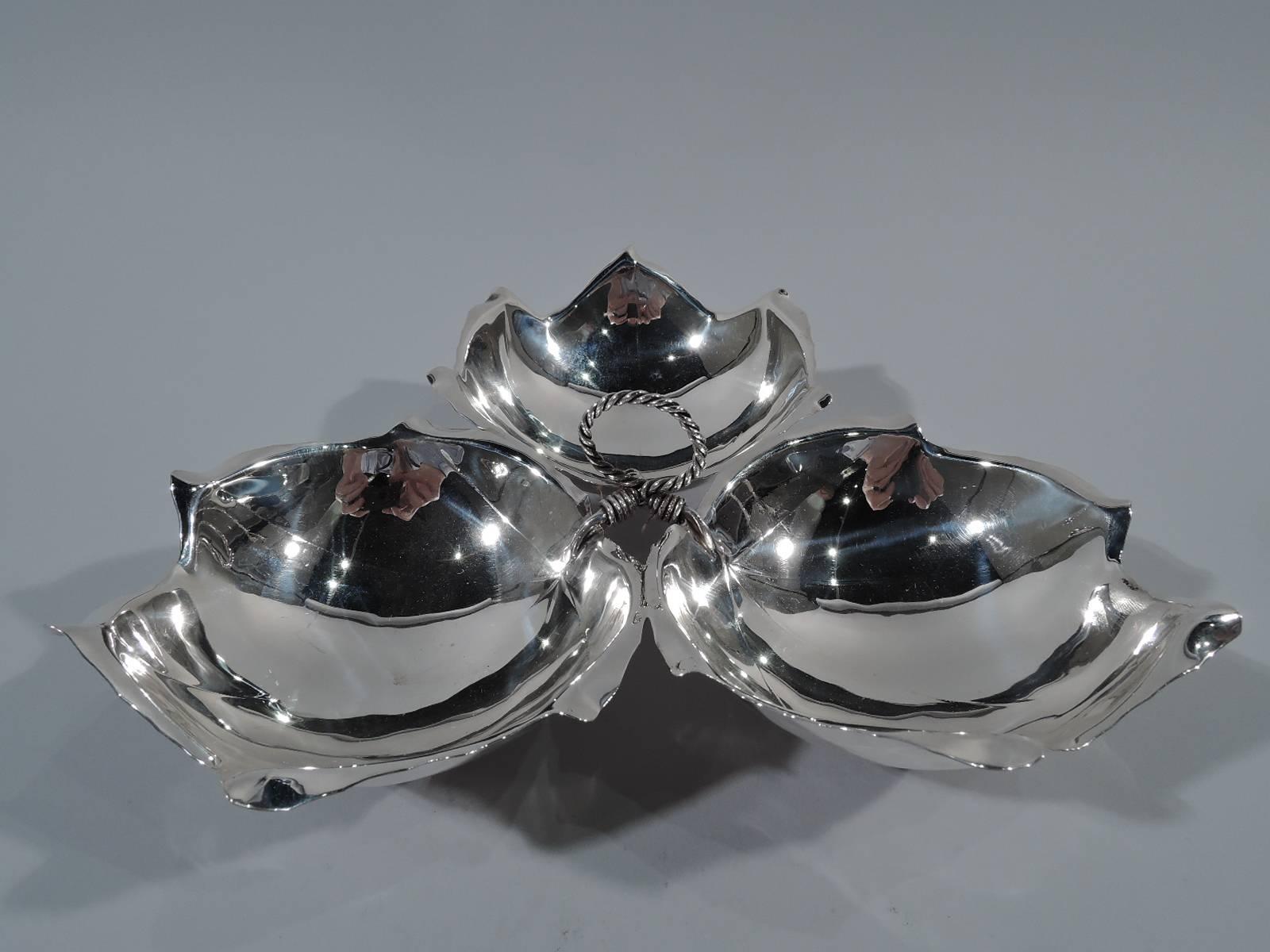 Mid-Century Modern sterling silver condiment server. Made by Alfredo Sciarrotta in Newport, Rhode Island for Black, Starr & Gorham in New York. Three leaf-form bowls tied together with wire. Rests on three ball supports. A playful but practical
