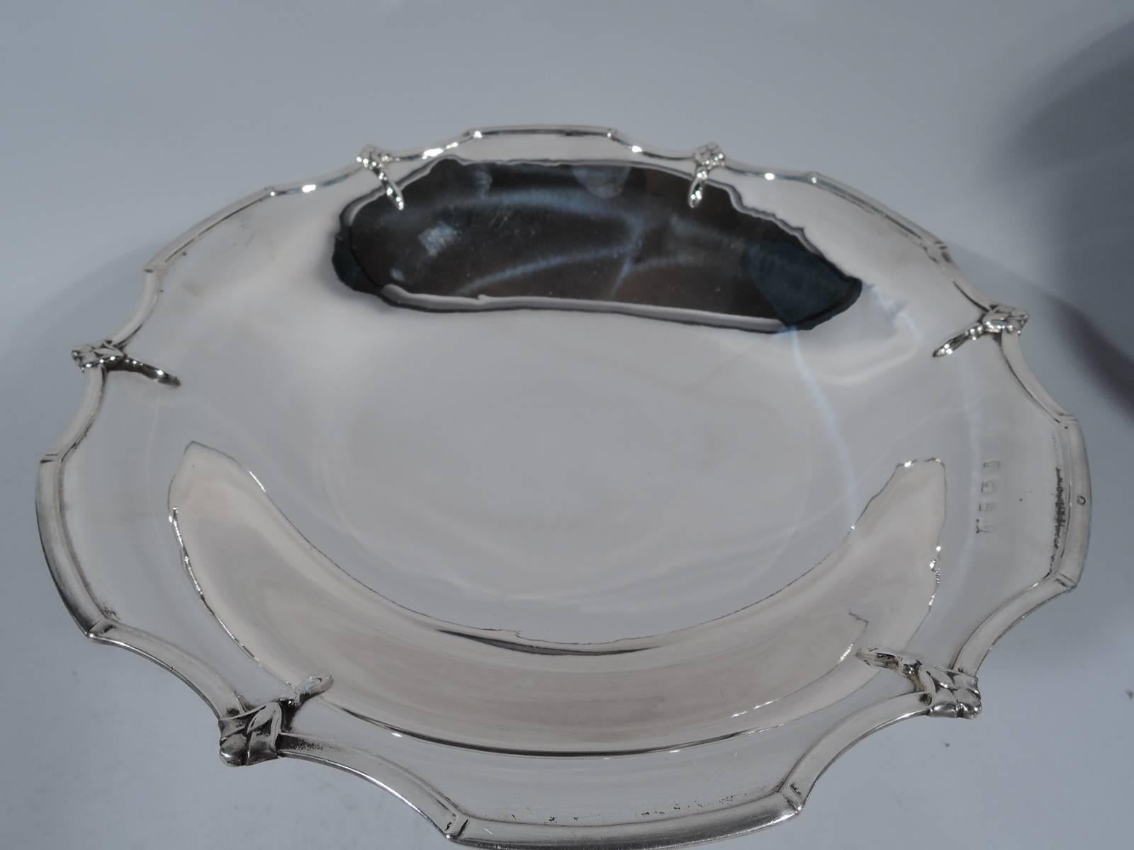 George VI sterling silver compote. Made by Barker Bros in Birmingham in 1940. Bowl on raised foot. Curvilinear rims with applied stylized flowers. Pretty and old fashioned. Hallmark includes French import mark. Measure: Weight 20 troy ounces.