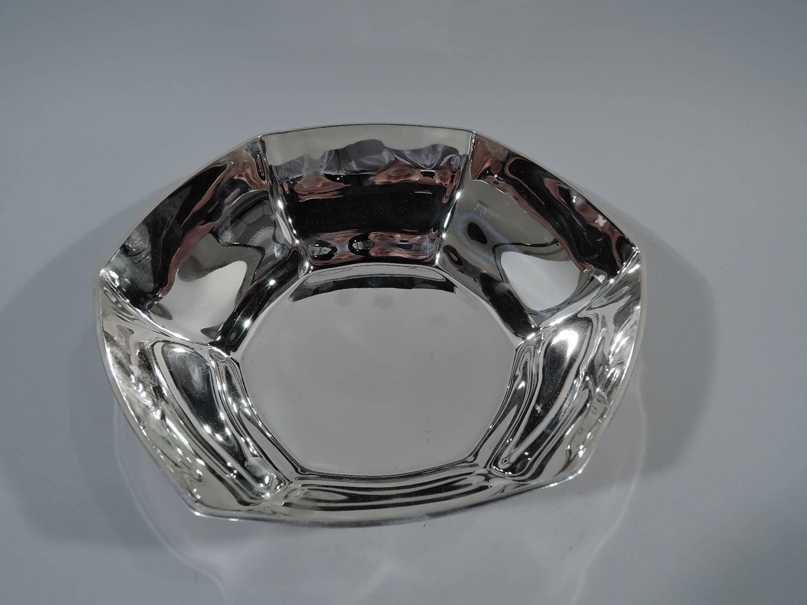 Art Deco sterling silver bowl. Made by Tiffany & Co. in New York, circa 1911. Hexagonal with curved and tapering sides and reeded rim. A softened version of the geometric style. Hallmark includes pattern no. 18165 (first produced in 1911) and