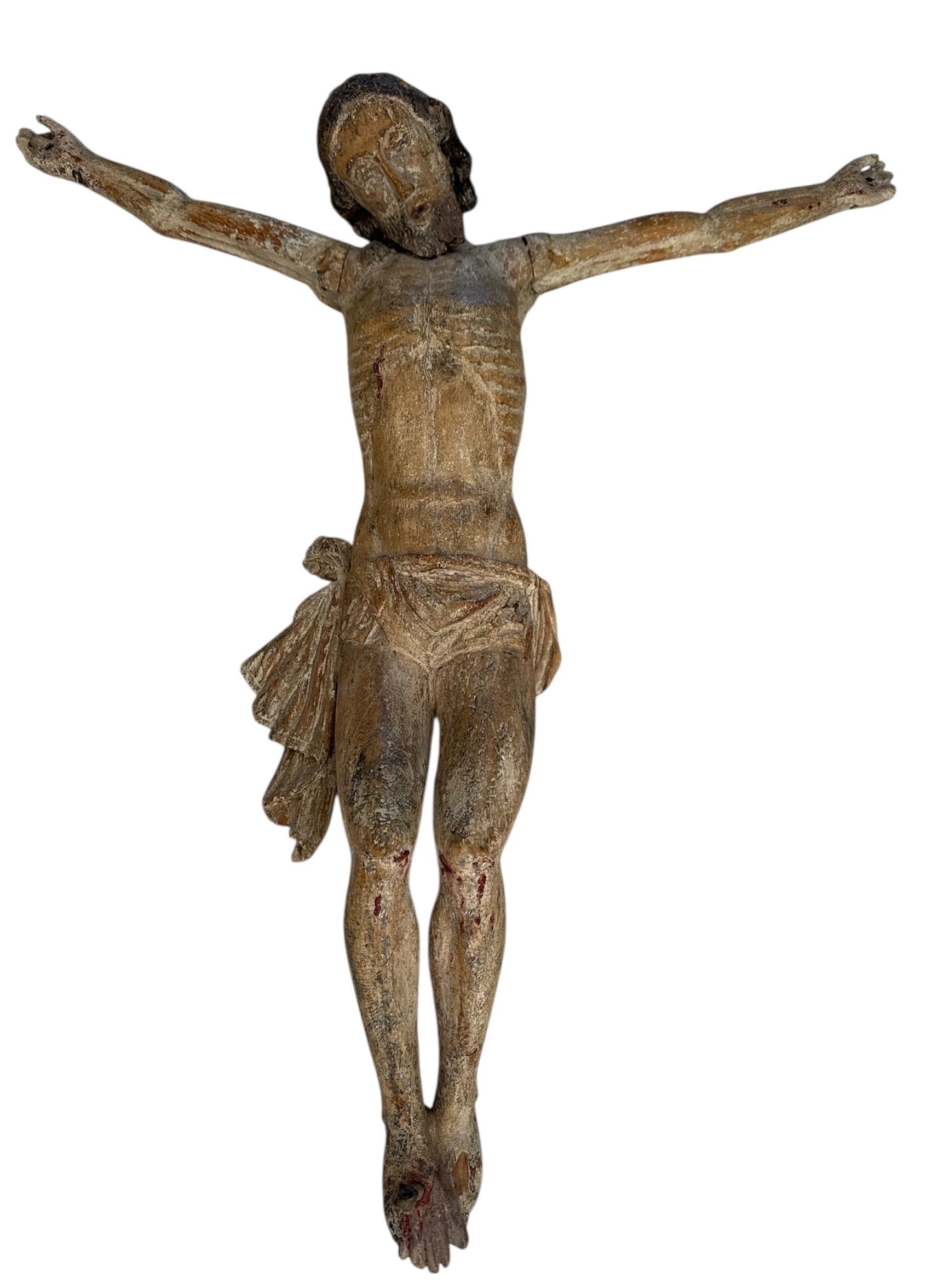 Corpus Domini italiano intagliato a mano con tracce di policromia.
Questa scultura riflette la transizione dallo stile gotico a quello rinascimentale.