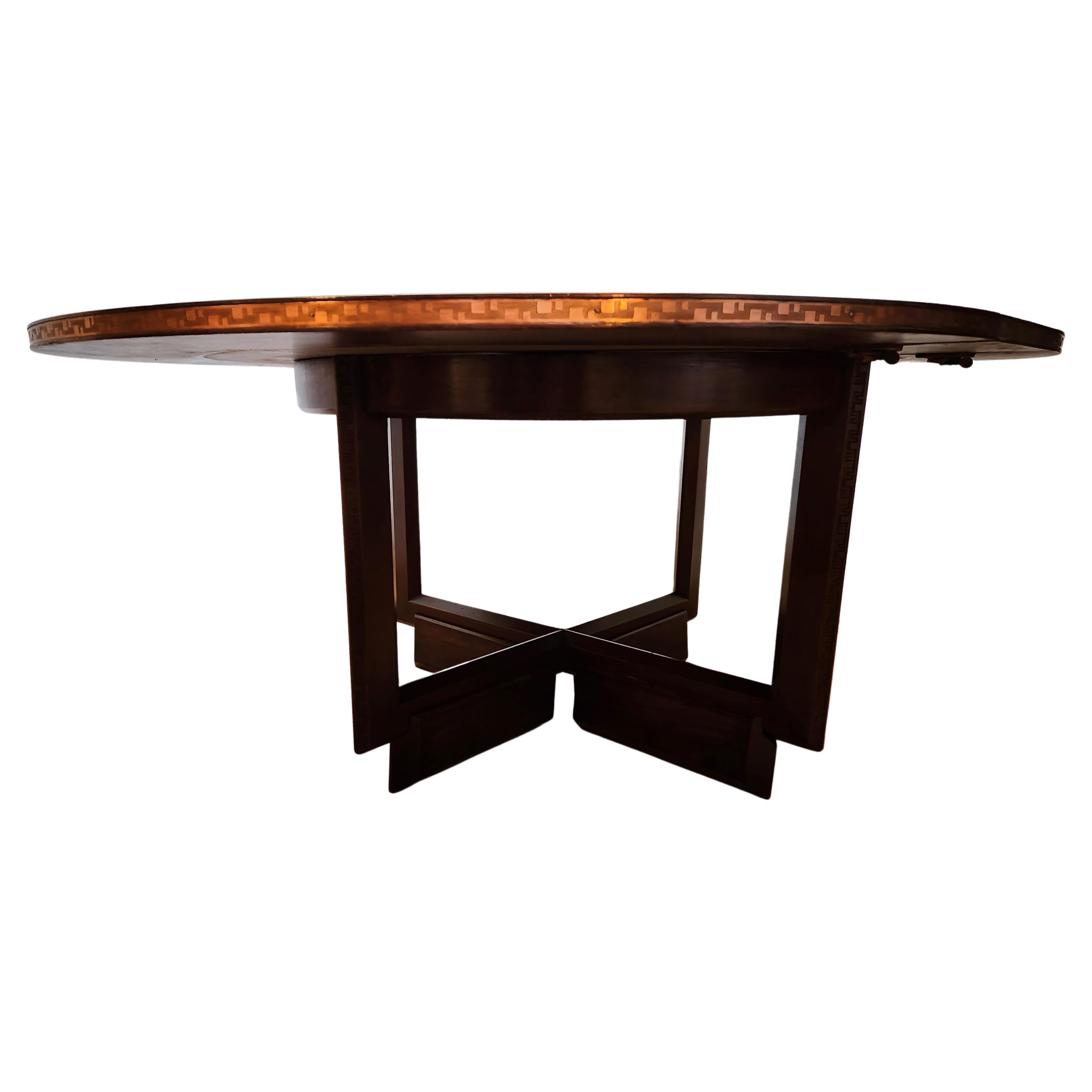 Classic Frank Lloyd Wright copper banded game table from Heritage Henredon manufactured for the two years 1955/56.
This table has a 12