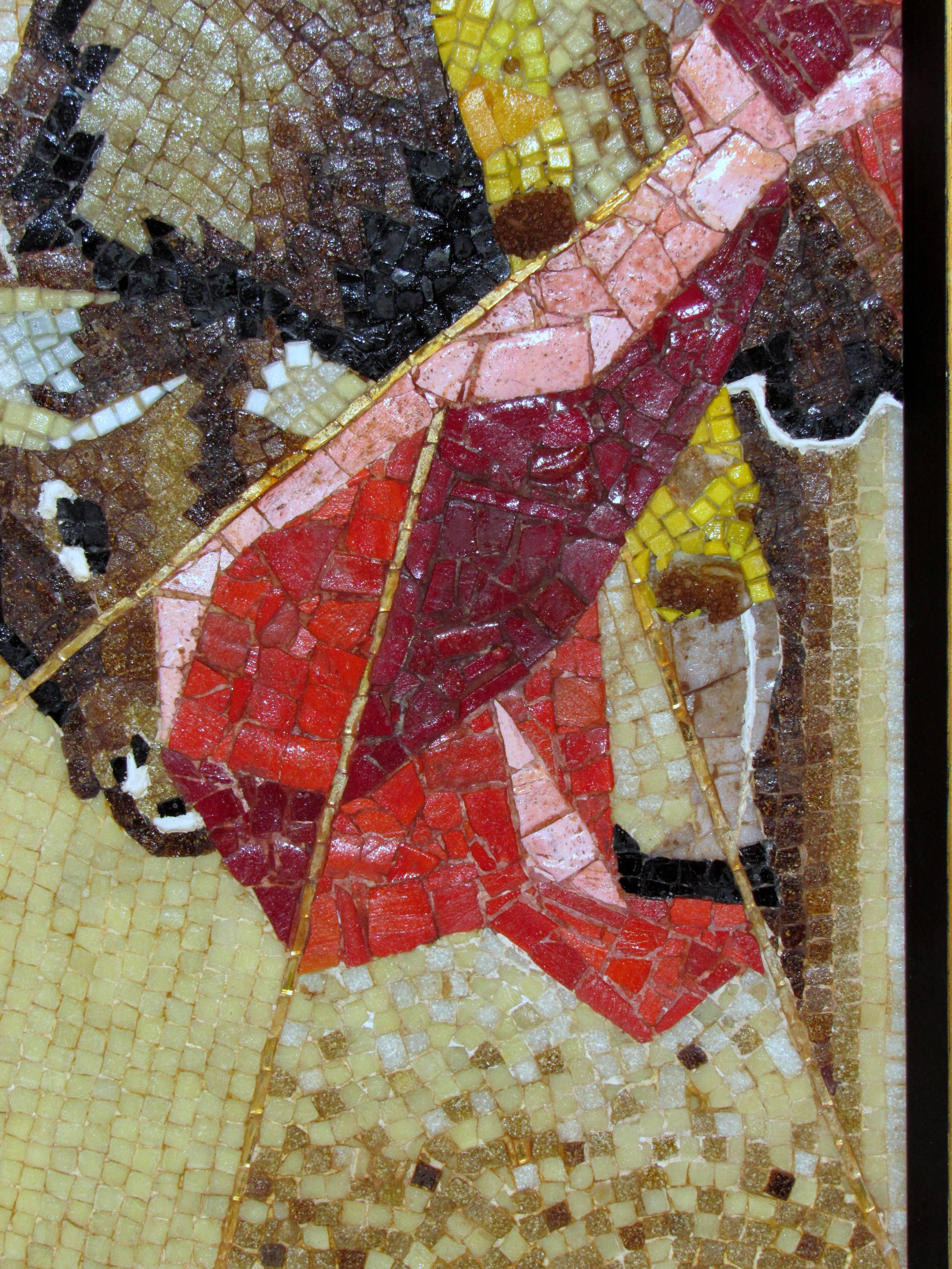 Rare unusual mosaic of glass tile with chunks of mineral and mineral chips creating a matador in a close encounter with a bull. The composition is segmented by straight lines of thin gilt mirrored tiles. Created in Mexico by one of its masters of