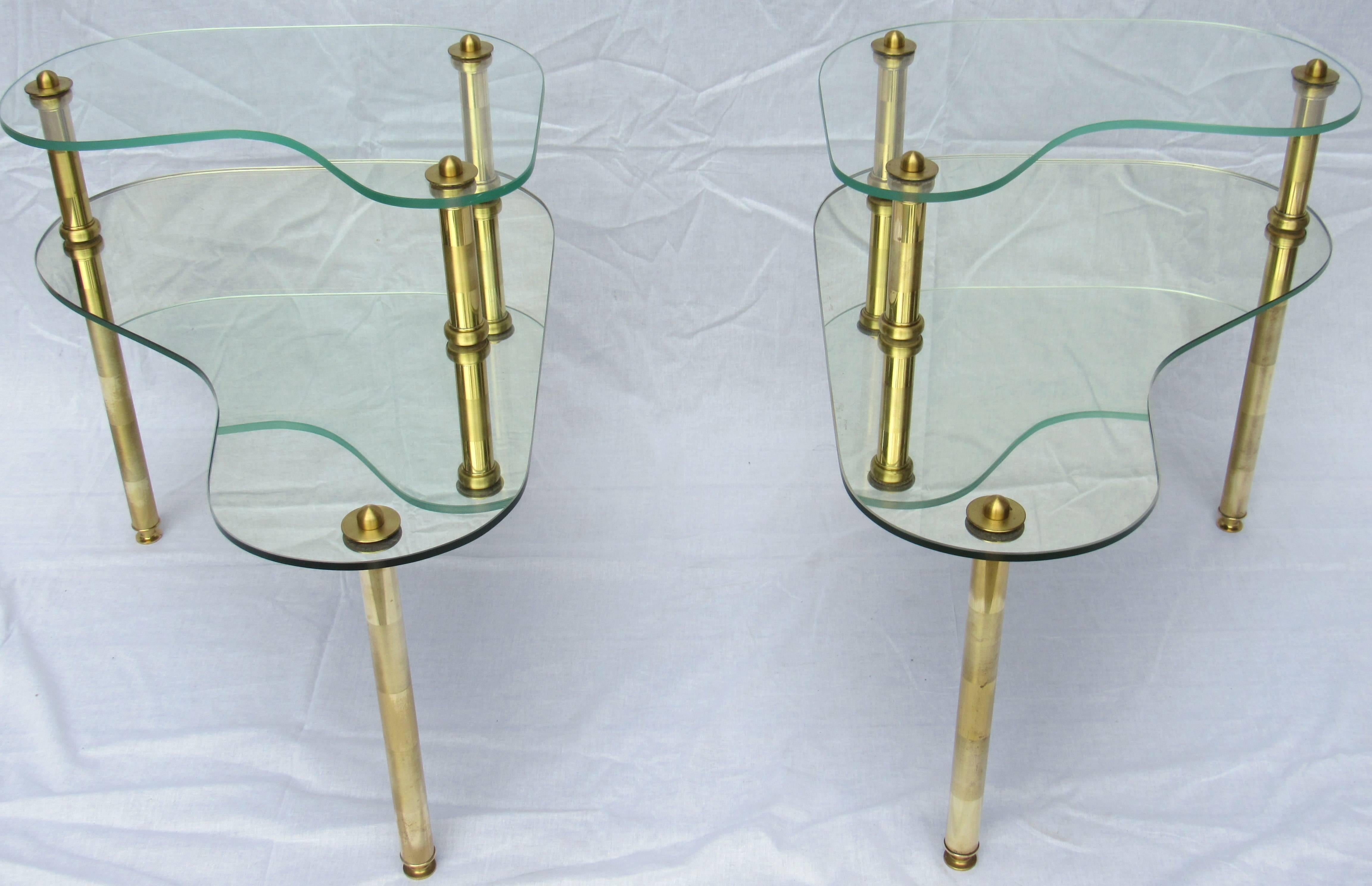 Semon Bache & Co. New York pair of chased brass matched end tables from New York City.
The tables are in excellent vintage condition with chased brass banding accents.