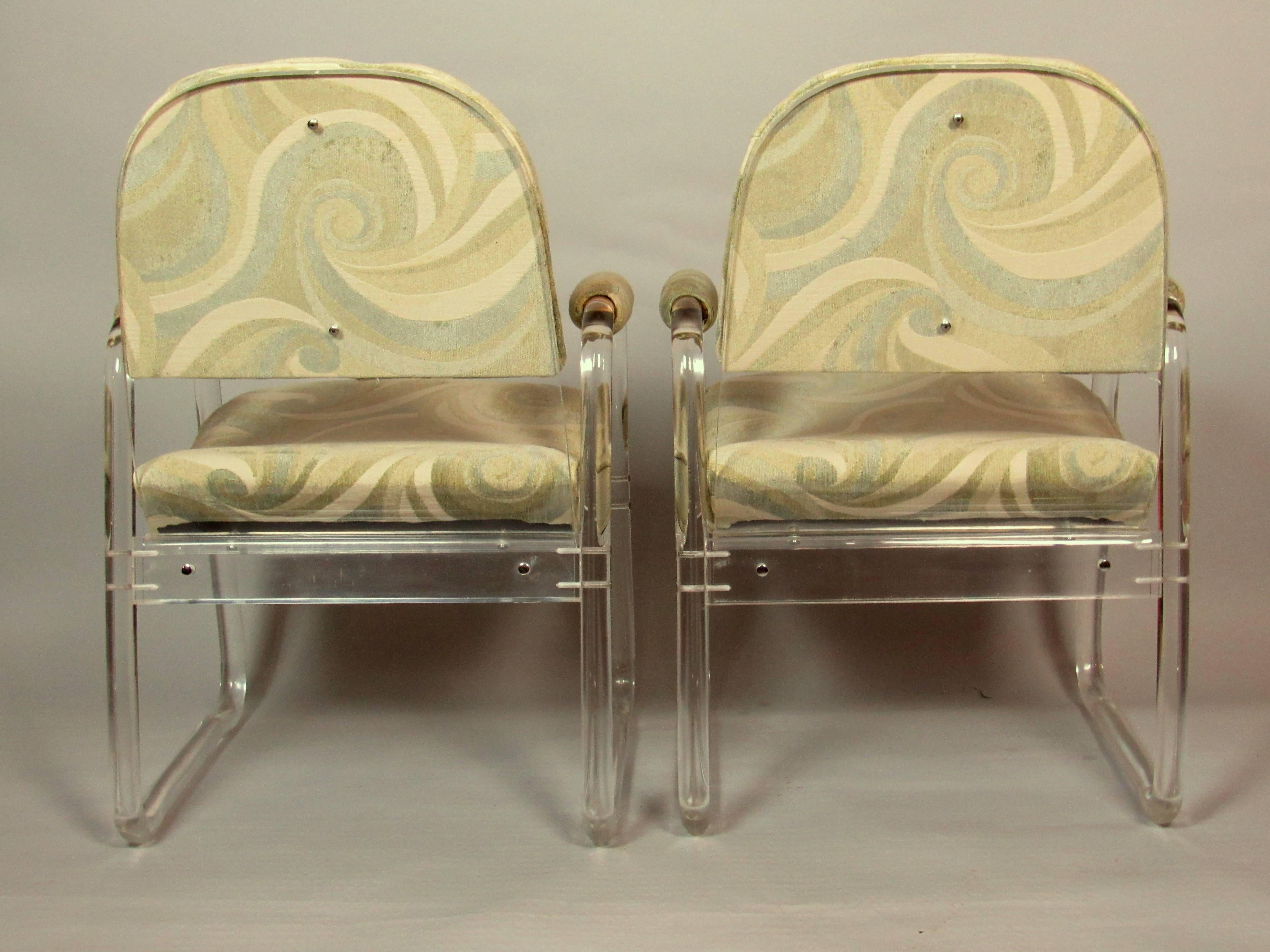 A pair of comfortable Lucite lounge chairs manufactured in the 1970s by Hill Industries.
The chairs are in excellent condition.