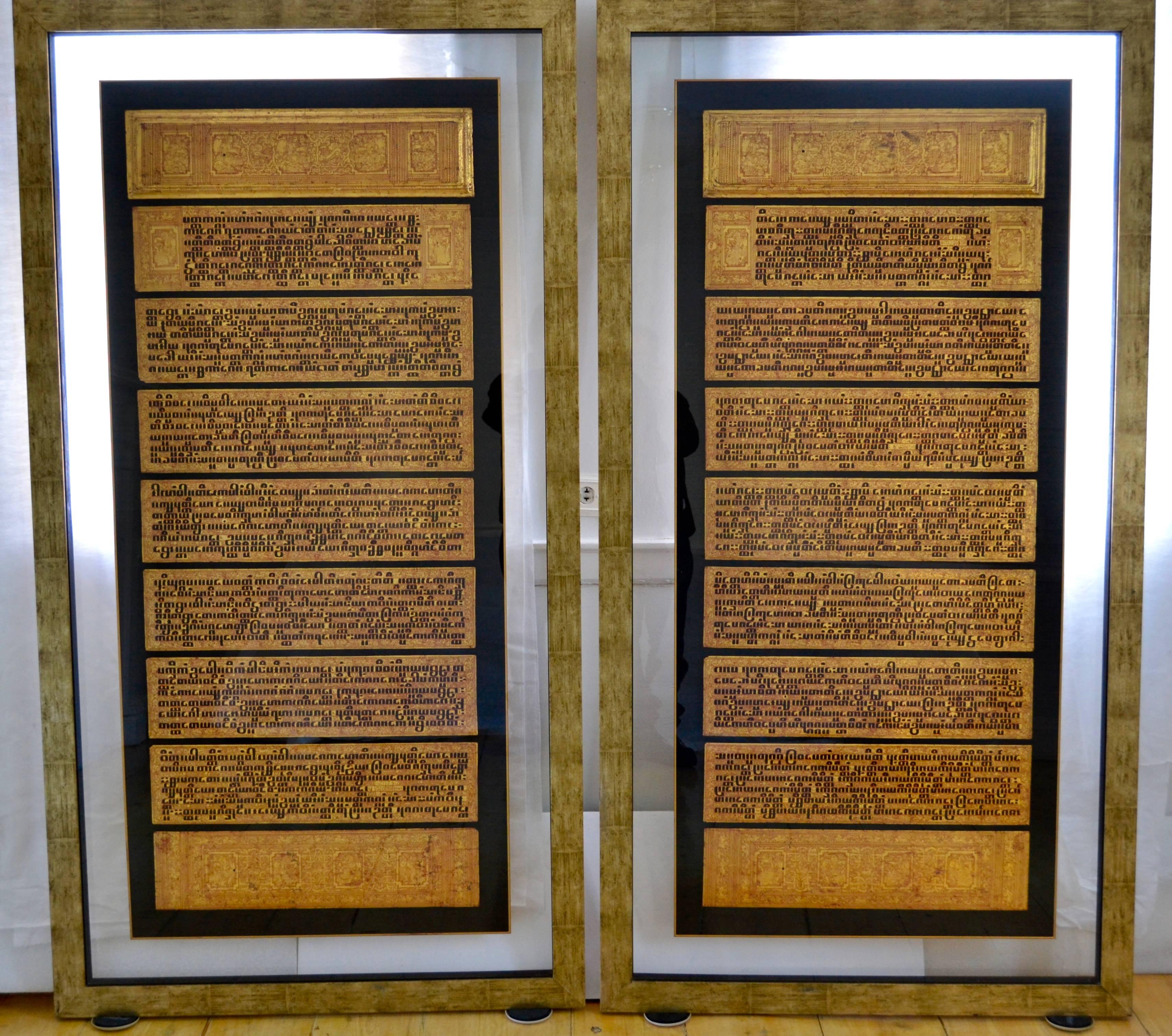 A rare pair of glass encased Burmese Kamawa-sa Buddhist texts consisting of 14 double sided unbound pages, made from thin sheets coated with layers of orange-red lacquer, which is hardened into a firm yet plaint surface. Each side has about six