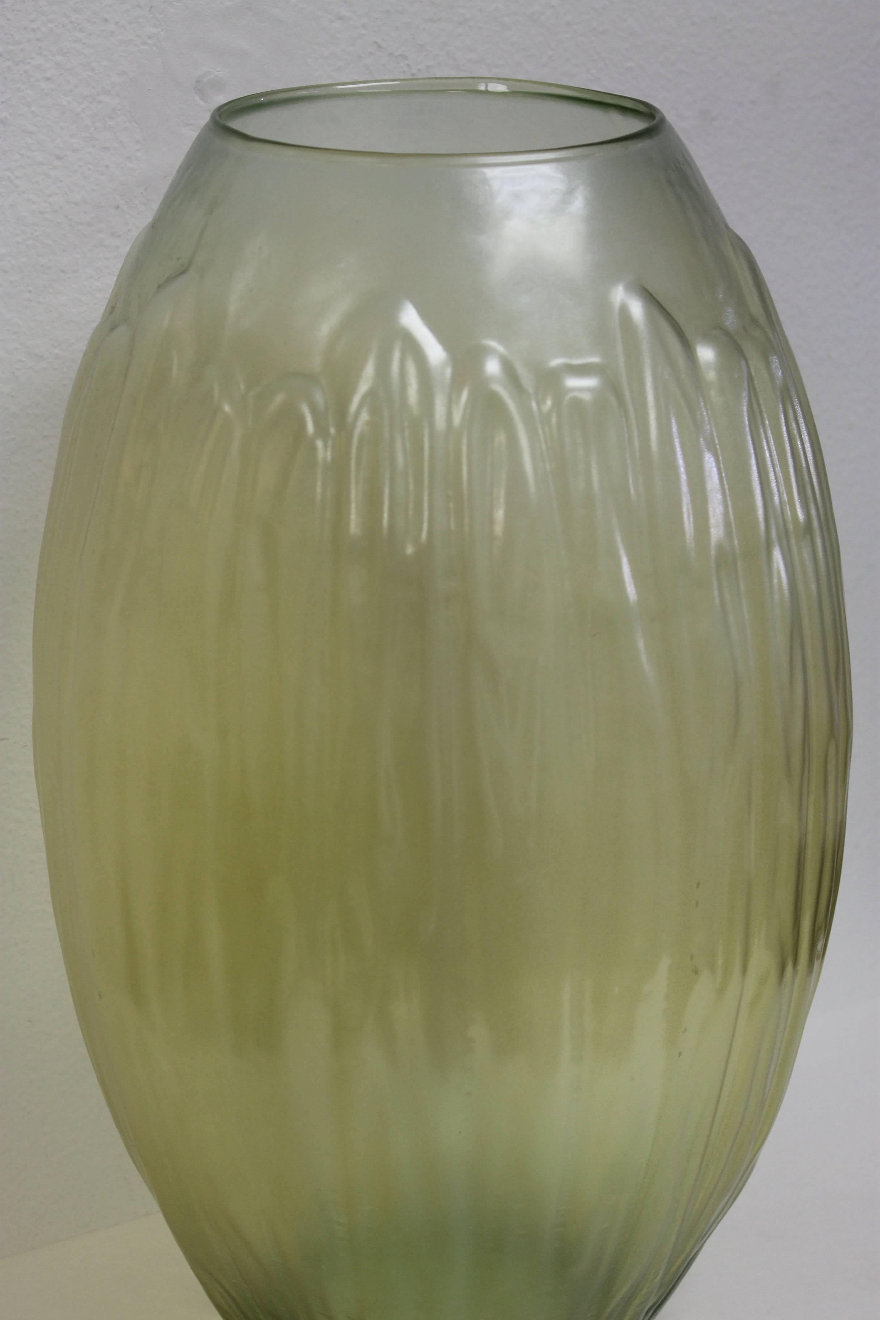 Beautiful pale chartreuse similar to Vaseline glass vase. Vase has raised leaf-like tendrils. Not sure if American or French. Vase measures 19.5
