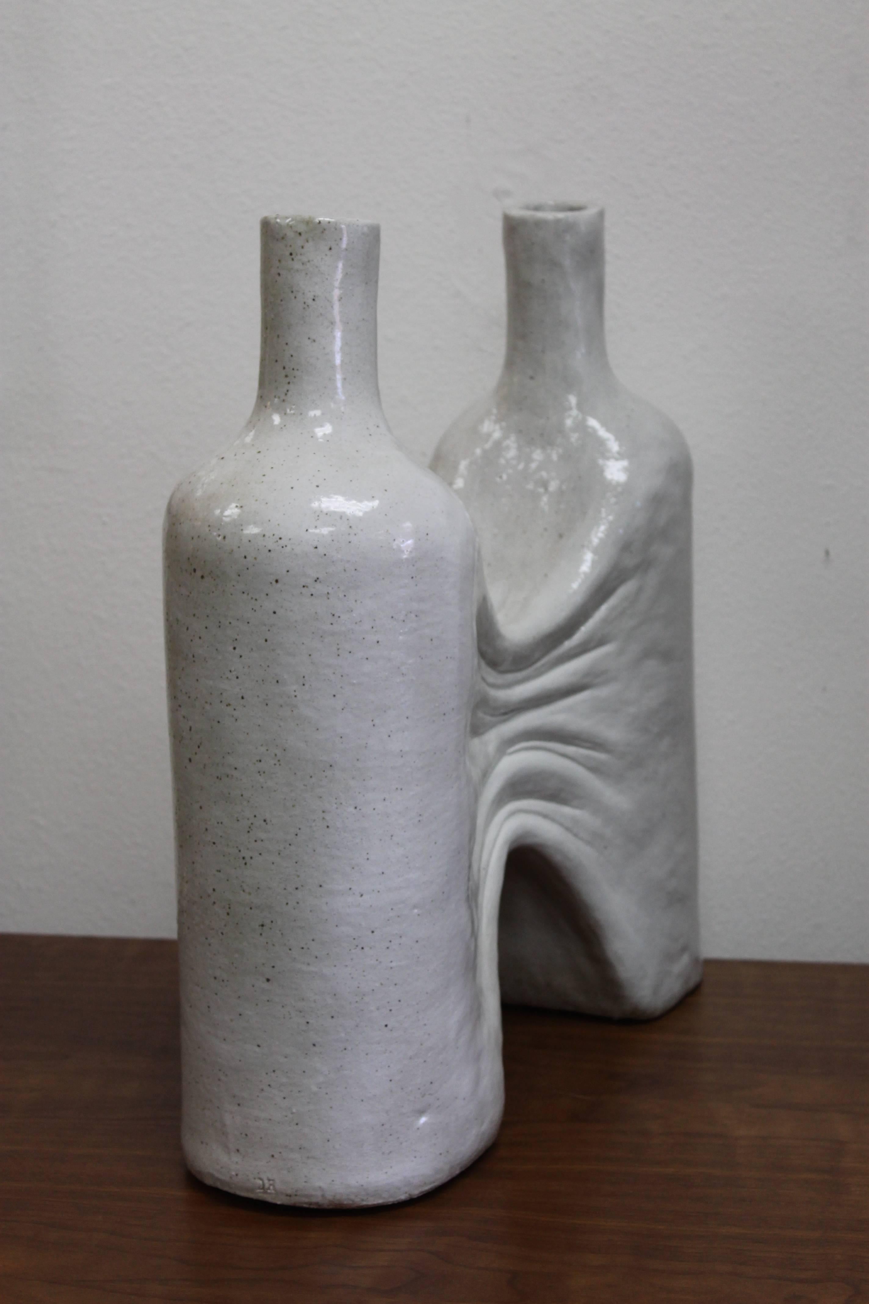 Ceramic vessel can be used as a sculpture or a vase. Created by ceramicist or artist Daric Harvie.