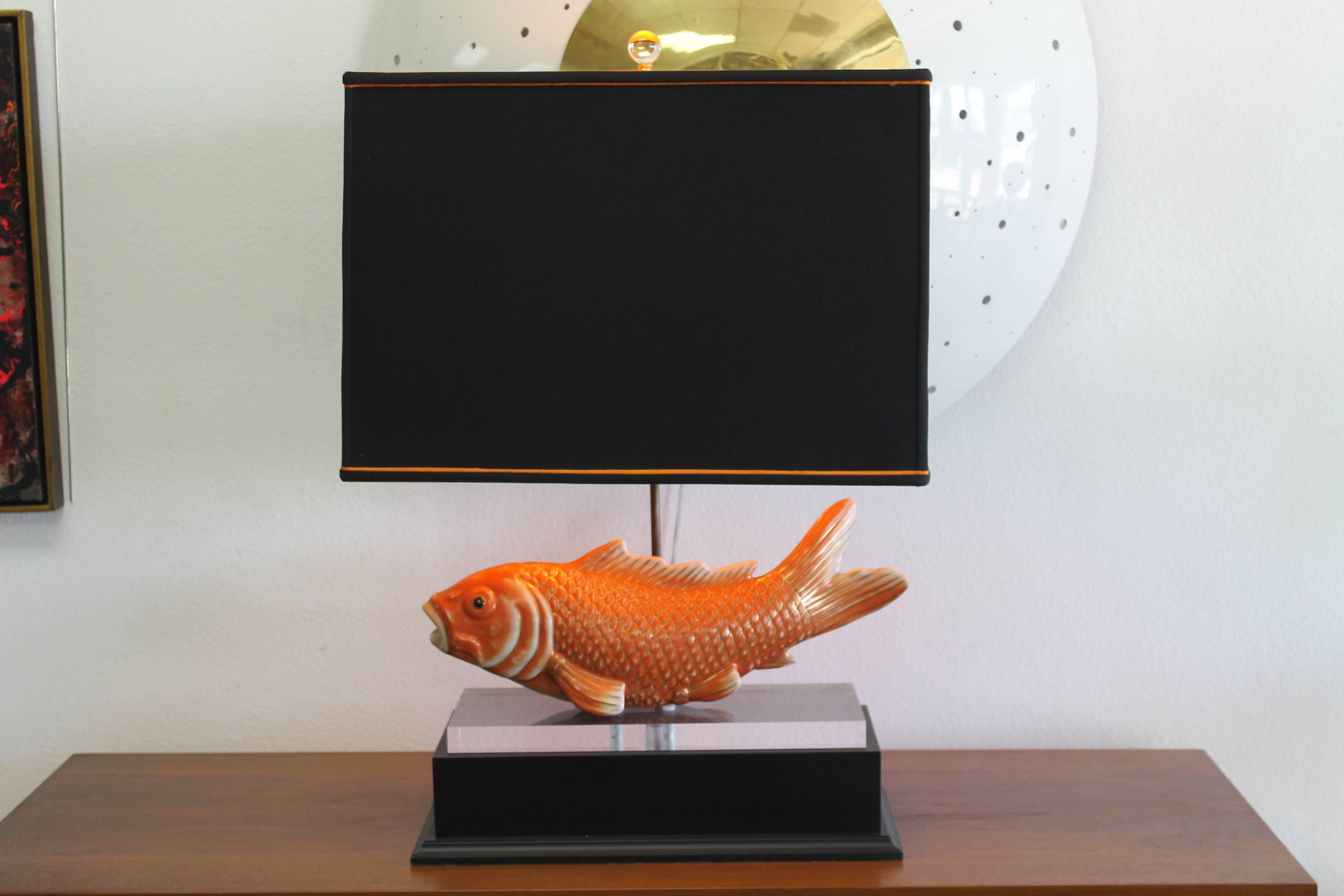 Pair of beautiful custom designed koi lamps with black and orange lamp shades. The black base is 17.5