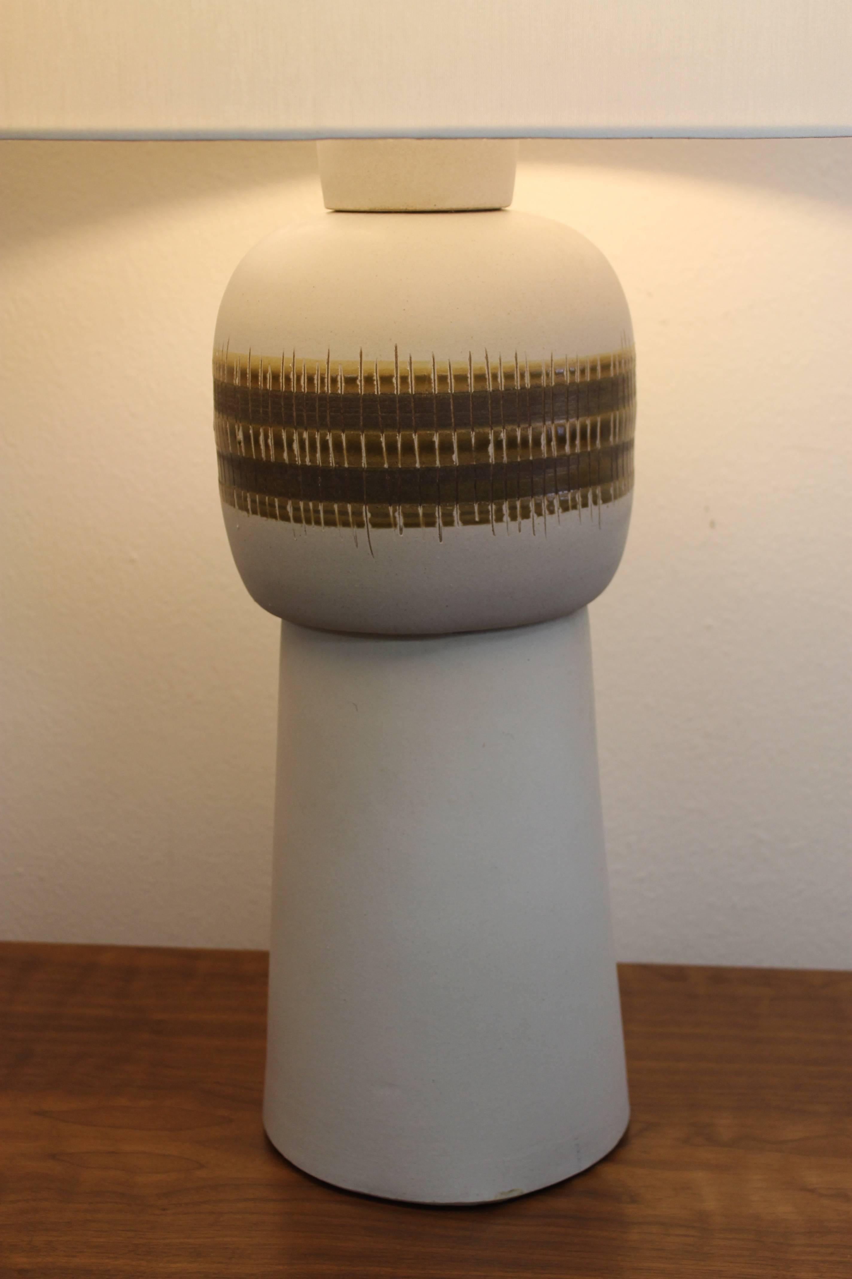 Monumental Martz lamp with three ceramic portions totaling 21” high and 8” diameter. Total height from base to the top of finial is 33.5