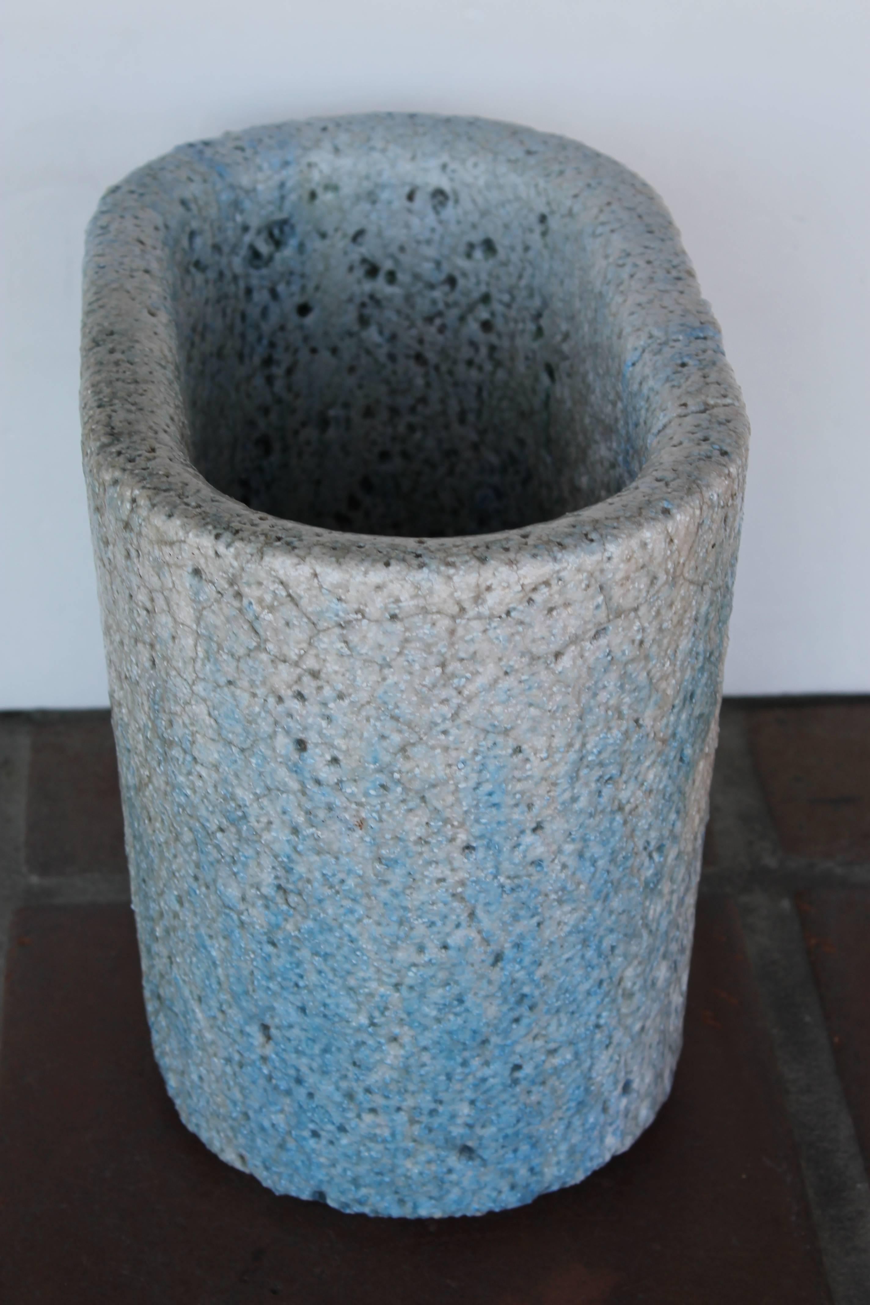 Salvaged from a now defunct glass manufacturer, this solid porcelain Crucible is heavily encrusted with many years of glass drippings, creating the marvellously textured and colorful surface you see here. Shades of pale blue, grey and white