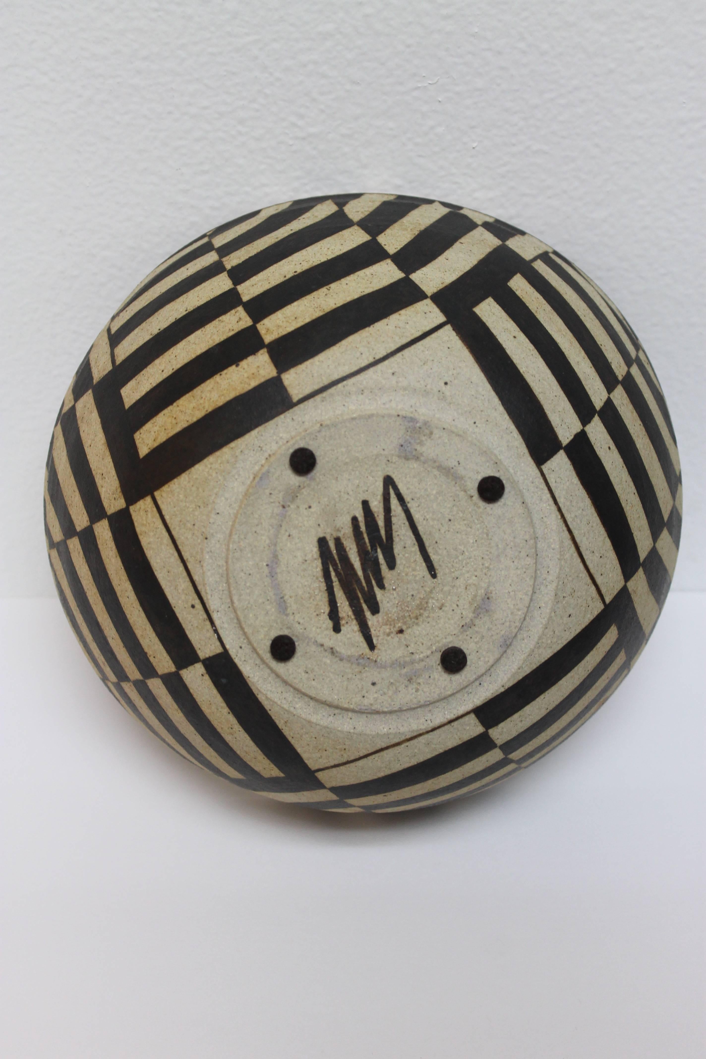 Kathleen Nez ceramic bowl.
She came to Santa Fe from LA to study printmaking at the Institute of American Indian Arts, where she earned a bachelor's degree in Fine arts and discovered a love for ceramics. She ultimately became well-known for her