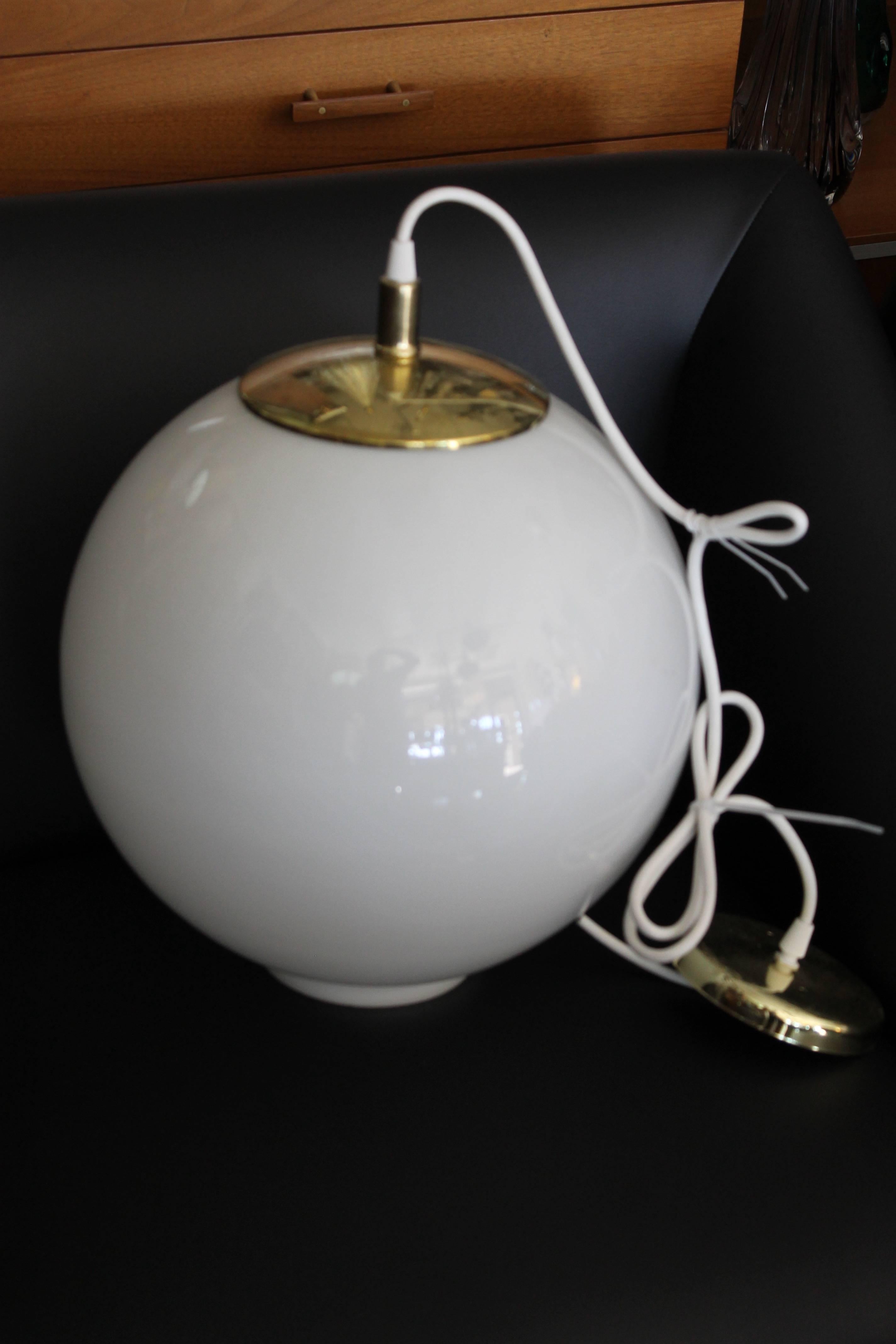 Circular glass globe pendants. Pendant measures 14