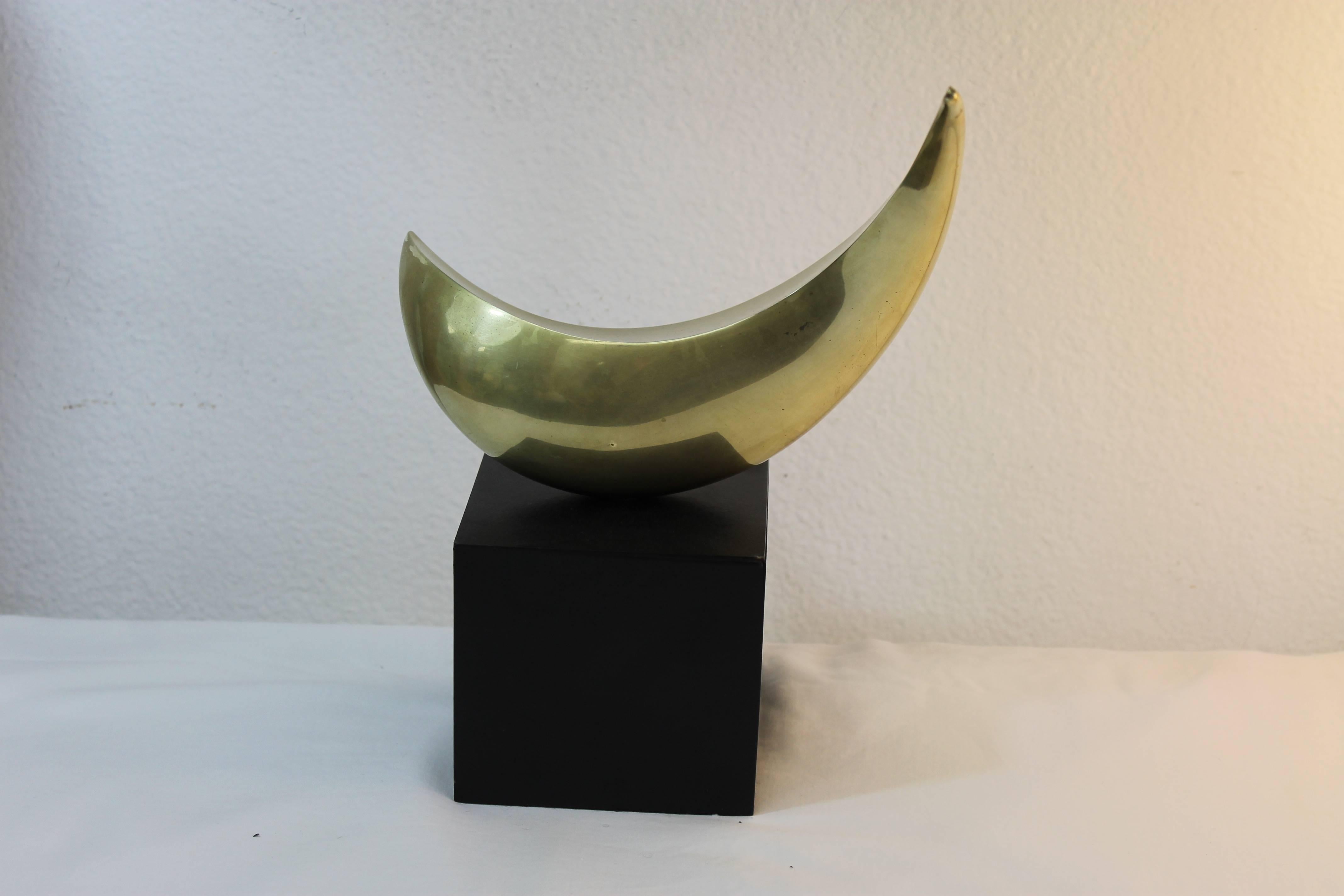 Hand forged one of a kind bronze sculpture by San Francisco artist Louis O. Pearson (1925-2005). Signed and dated 1974. Base measures 4.25" deep, 4.25" wide and 4" high. Brass sculpture is 9" wide, 3" deep and 7" high.