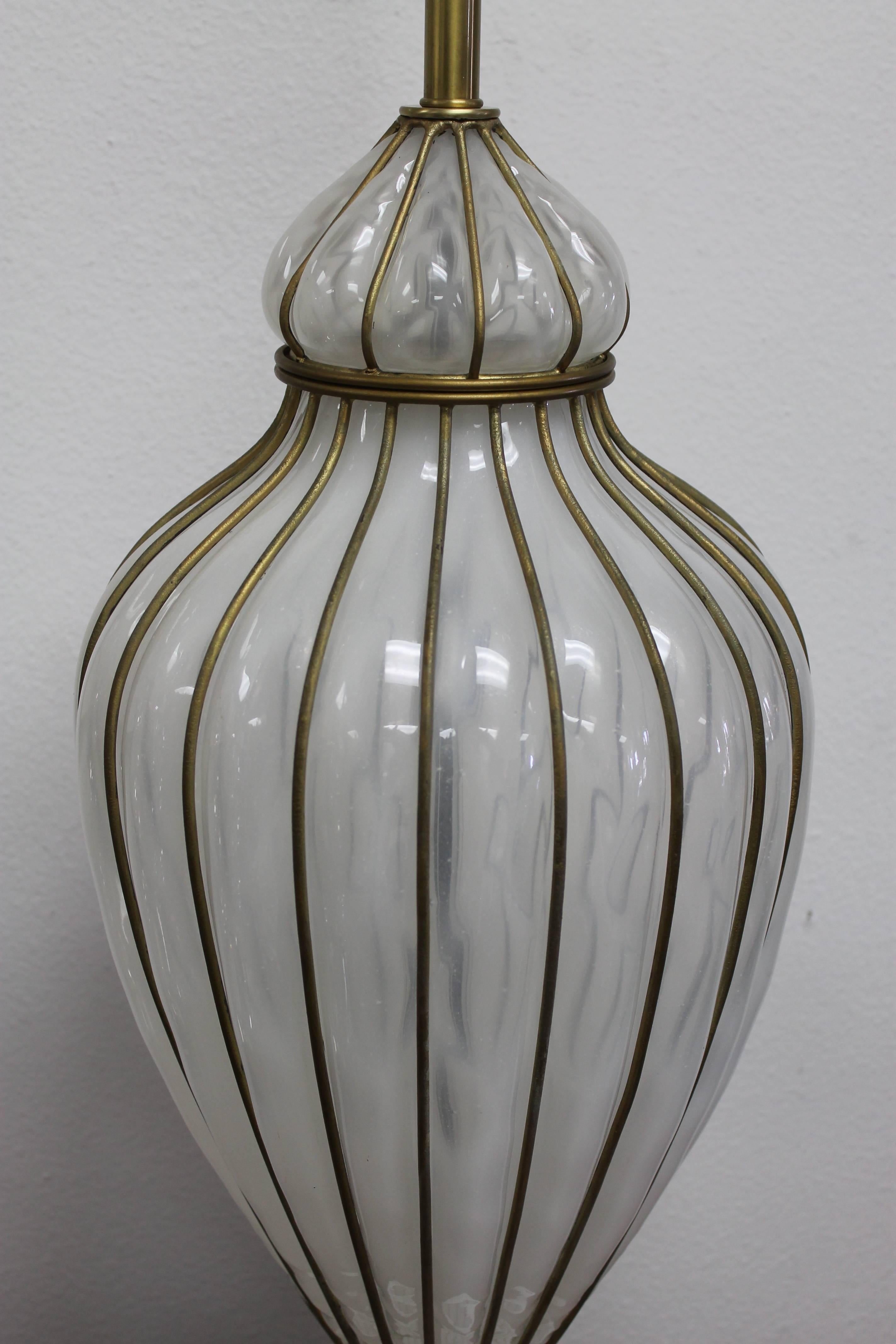 Beautiful Venetian glass lamp by the MARBRO lamp company.   Lamp has the MARBRO label stating it's Venetian Glass.  Base has been painted white and has been professionally rewired.  The glass portion is 24" high and 11" diameter.    Brass