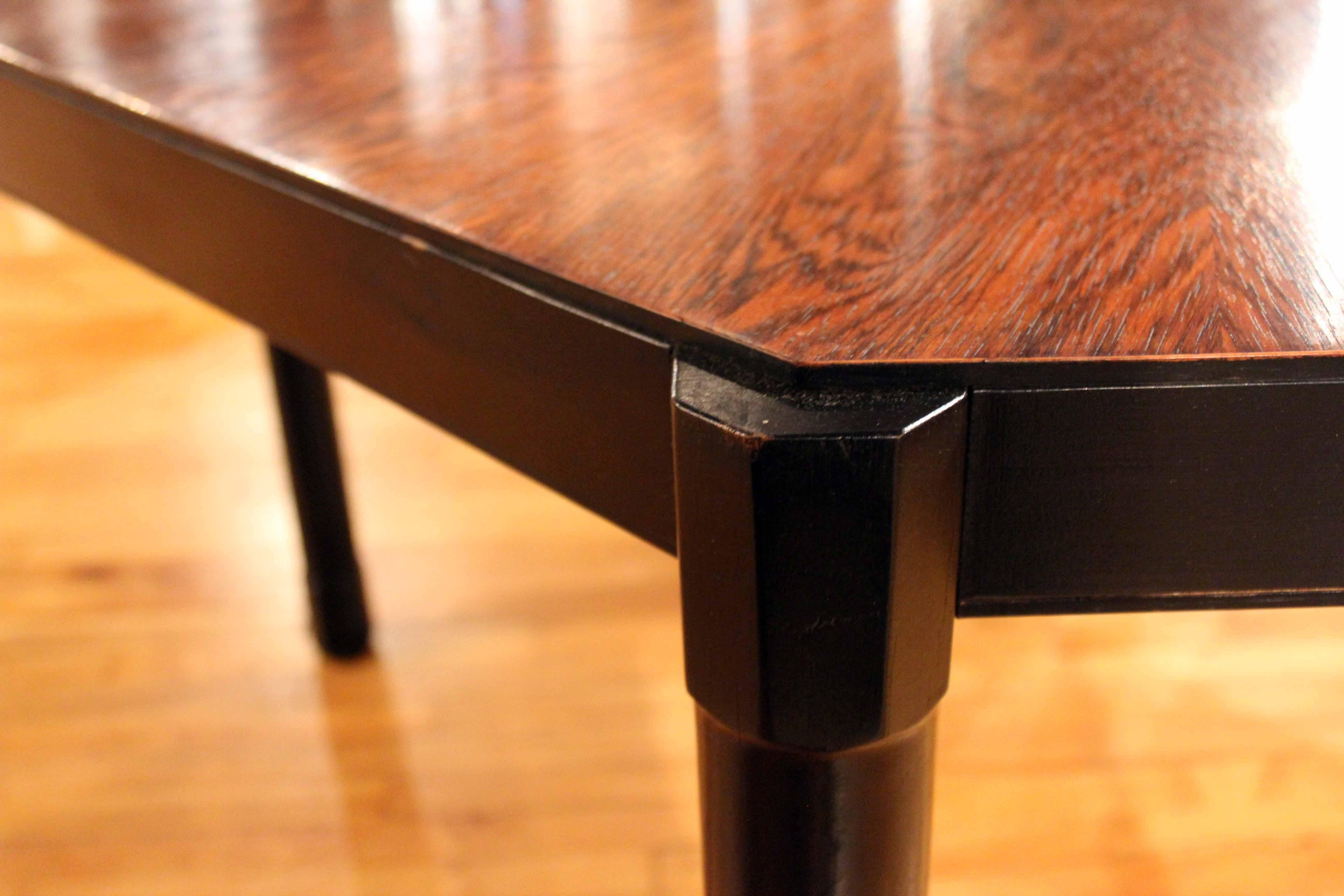 Italian Macassar wood center table with ebony edge and legs, octagonal shape.