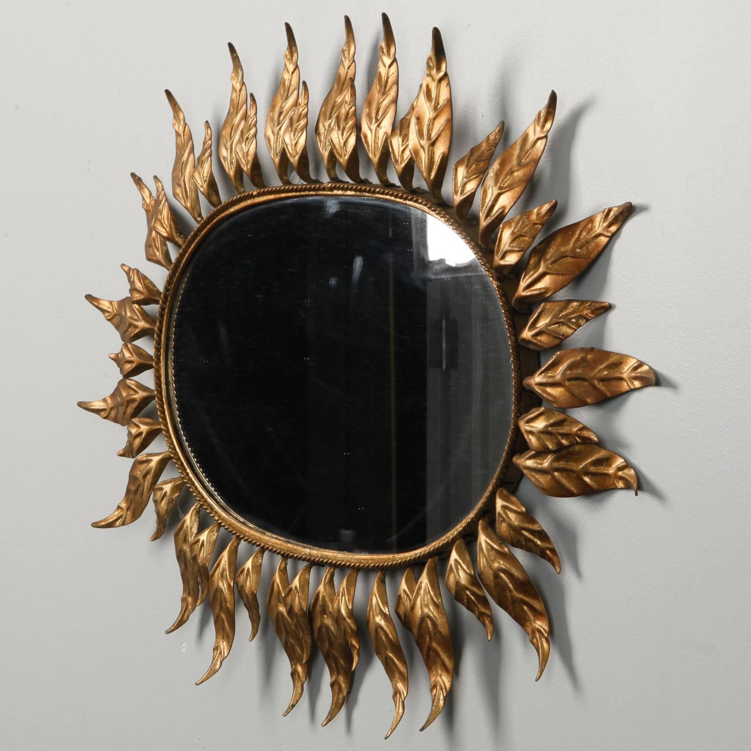 Gilt Midcentury Oval Mirror with Gilded Leaf Form Sunburst Frame