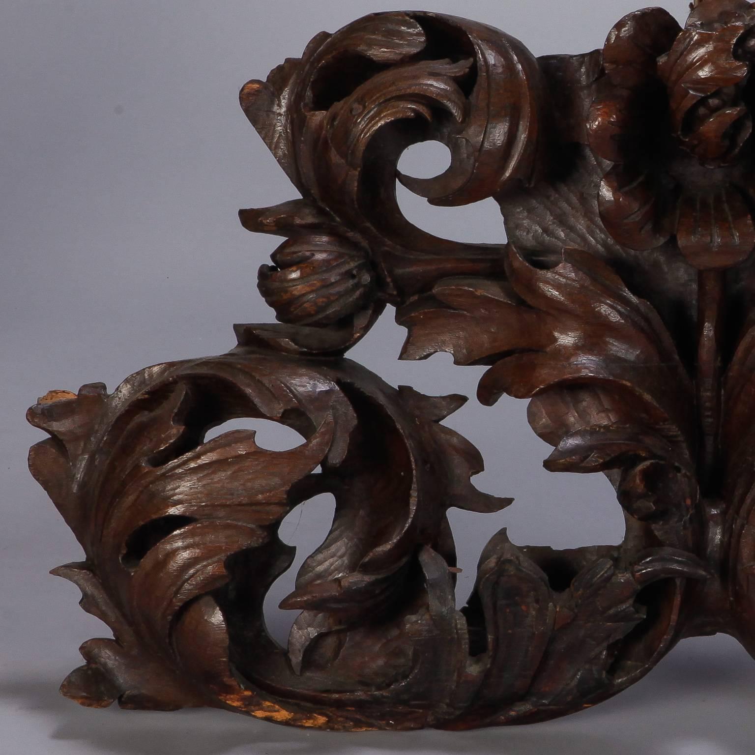 Circa 1900 large hand carved oak architectural element from Portugal. Central flower surrounded by scrolls and foliate details. We have another similar piece that is a slightly larger.  Please inquire.

 
