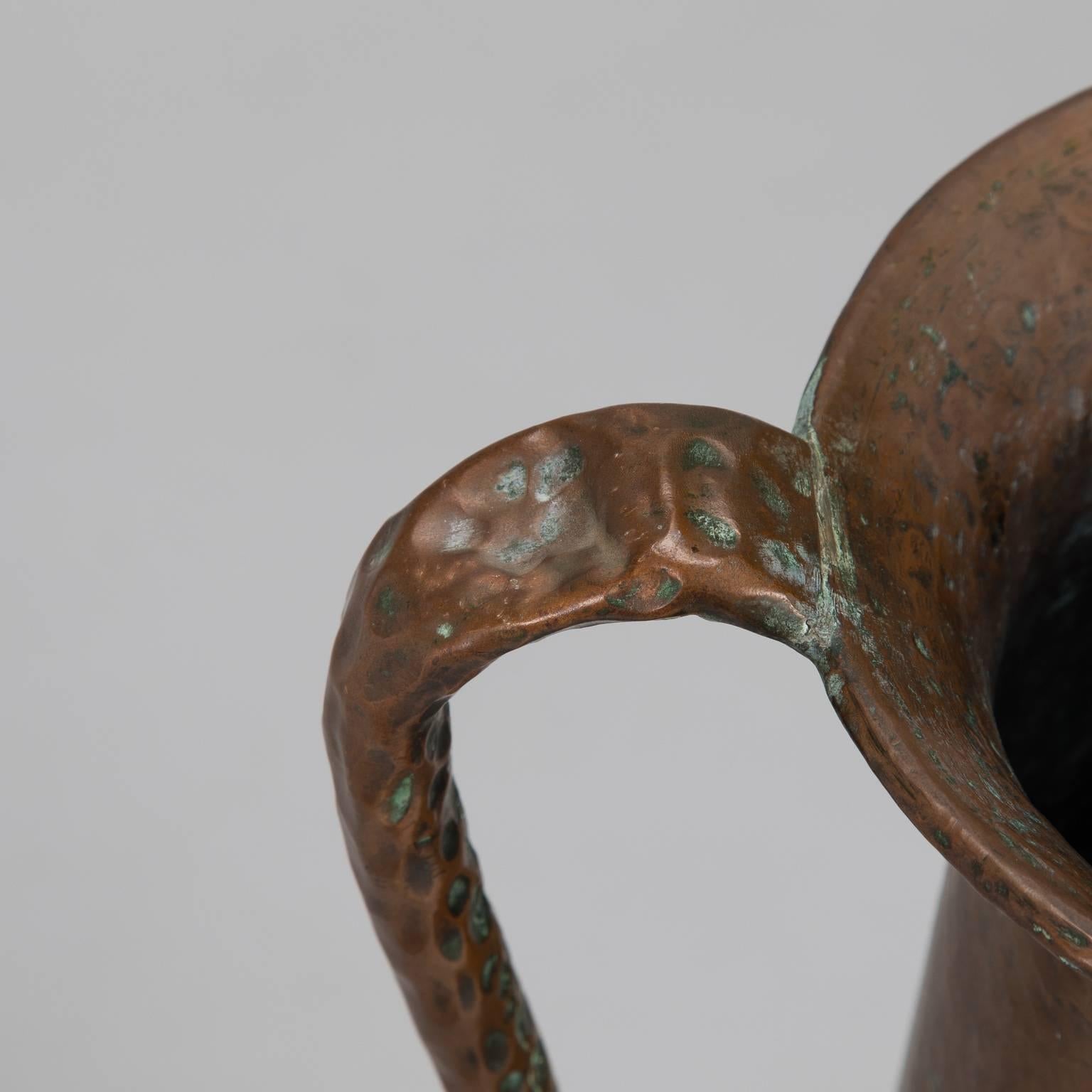 Tall Italian Amphora form copper vase with long slender neck and handles and hammered surface, circa 1940s. Signed with imprint on the bottom: L. COSTA Borgo Trento, Italy. Excellent vintage condition with patina to surface.

  