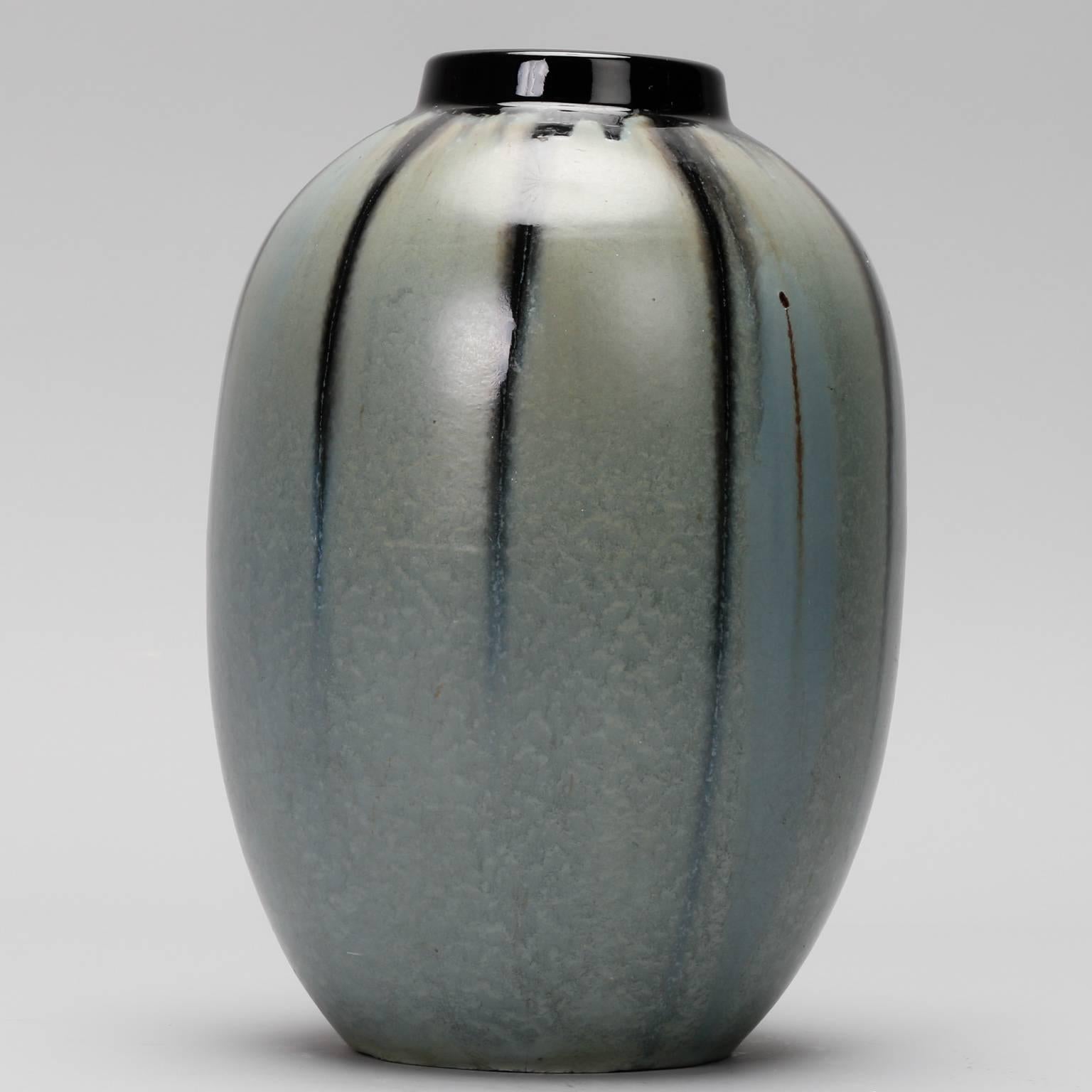 Blue grey ceramic vessel with black drip accents by Thulin of Belgium dates from 1920s.
 