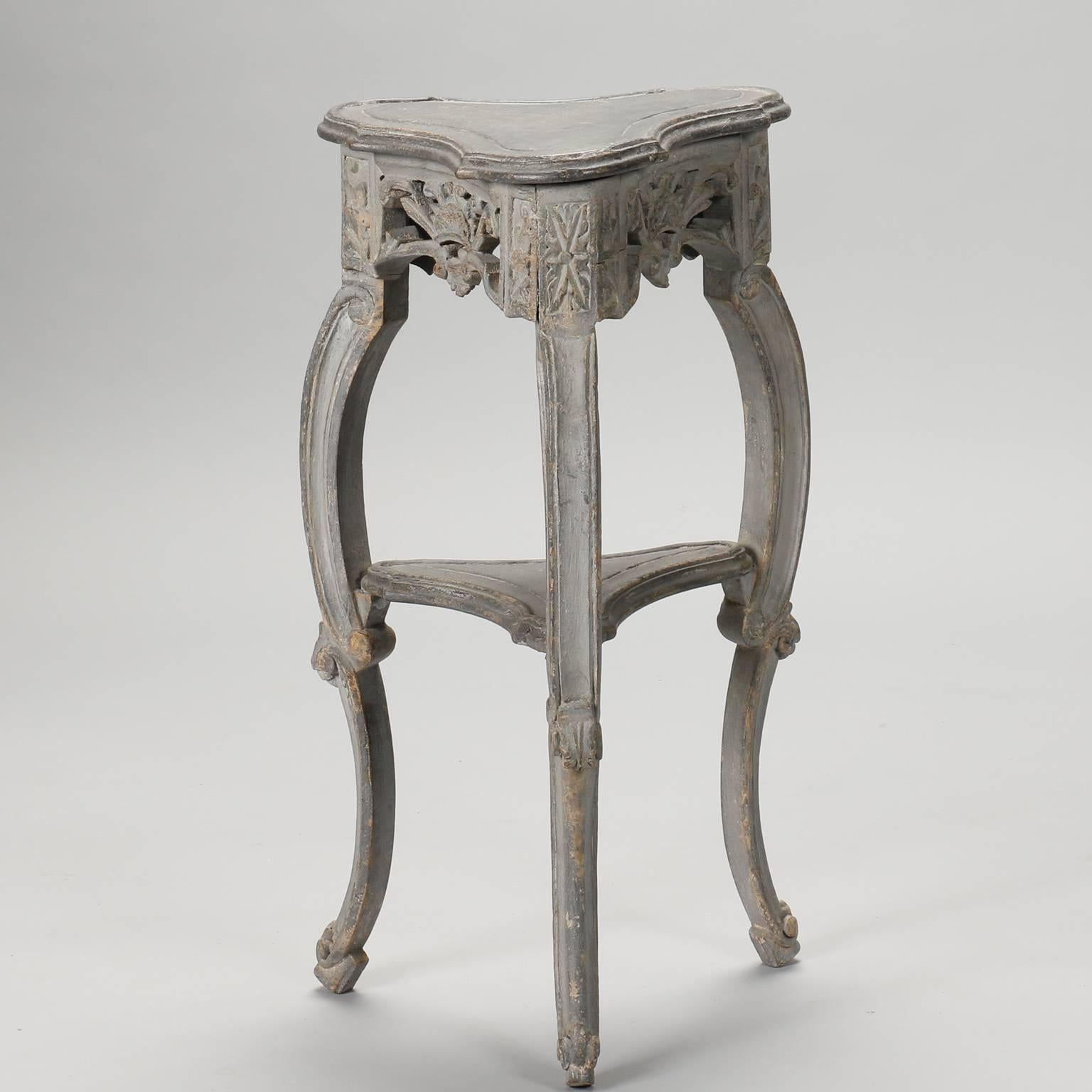 Small French side table with trefoil form top, carved details on the apron and curved legs with blue grey painted finish, circa 1900.