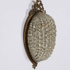 Pair of French Small Cast Bronze All Beaded Sconces