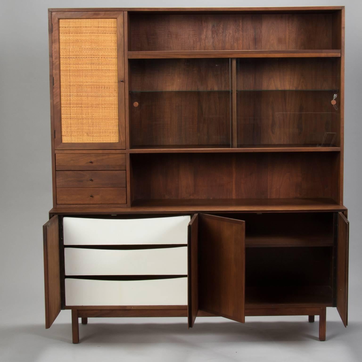 Walnut serving, buffet or sideboard cabinet from Dillingham's Esprit collection designed by Martin Borenstein. Often attributed to Milo Baughman, the Esprit collection shares a lot of the iconic early Baughman style elements, circa 1960s.
